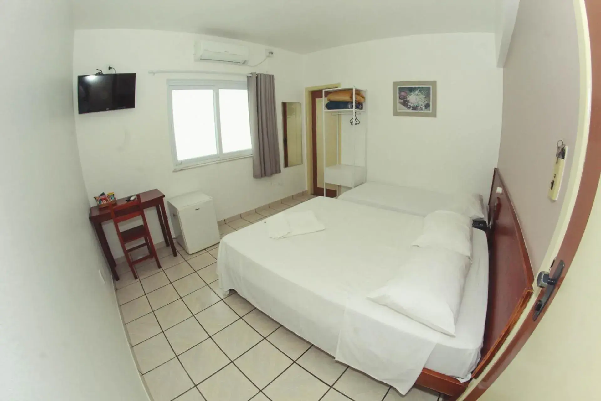 Standard Triple Room in Alpha Ville Hotel Standard Triple Room in Alpha Ville Hotel