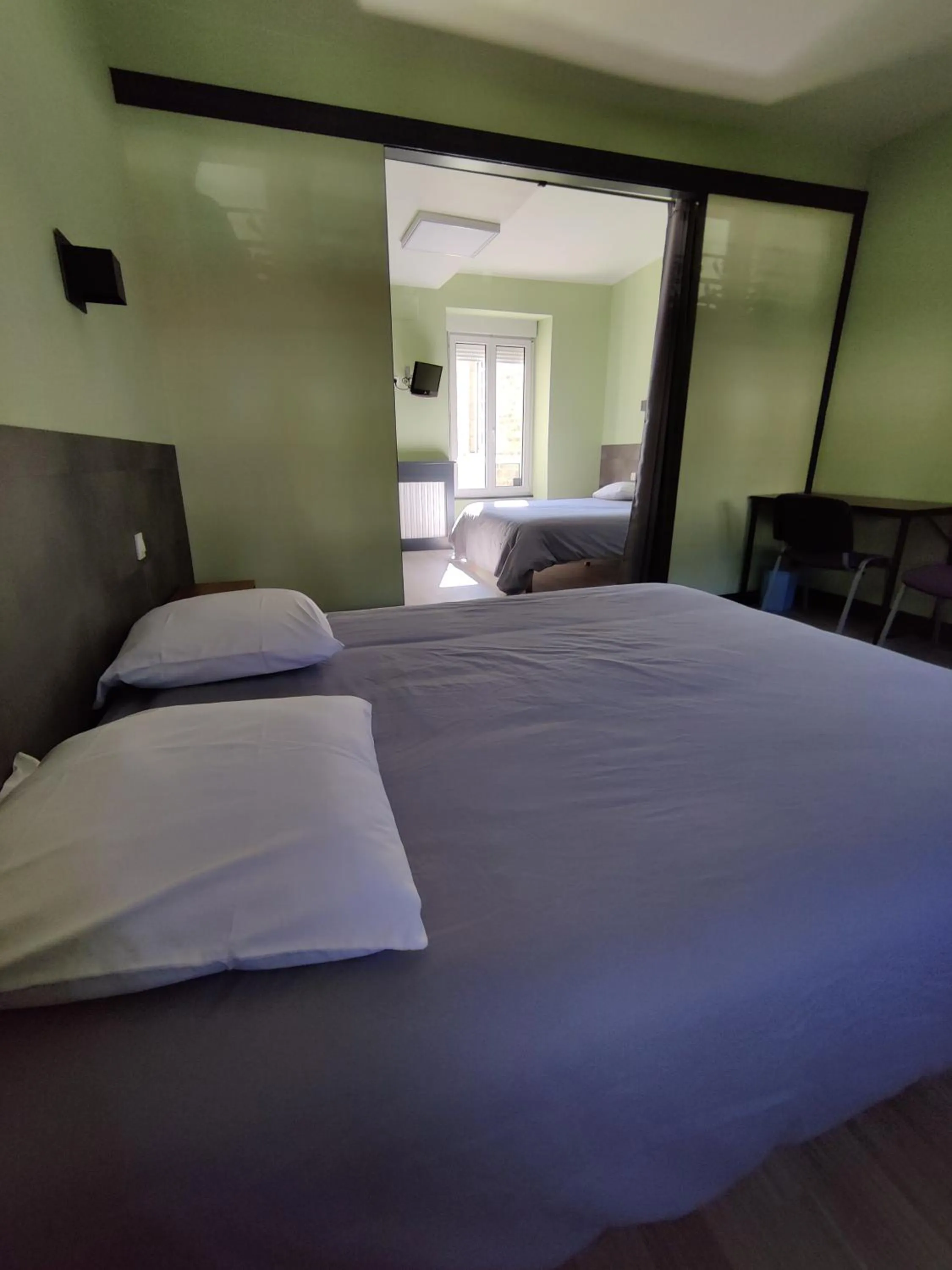 Photo of the whole room, Bed in Hôtel Saint - Pierre