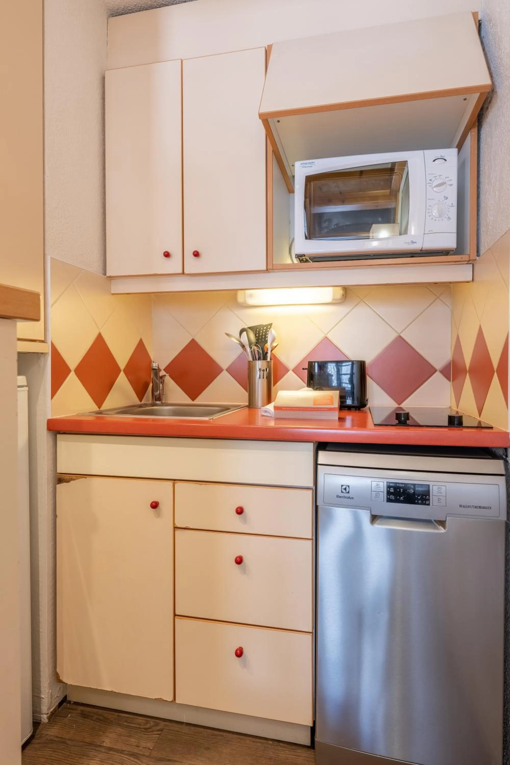 Kitchen or kitchenette in Résidence Pierre & Vacances Les Ravines