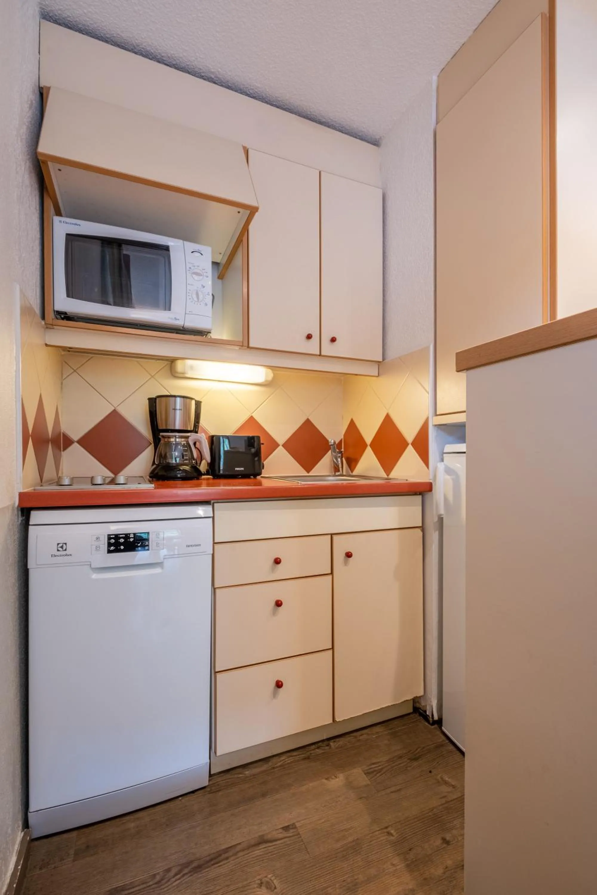 Kitchen or kitchenette in Résidence Pierre & Vacances Les Ravines