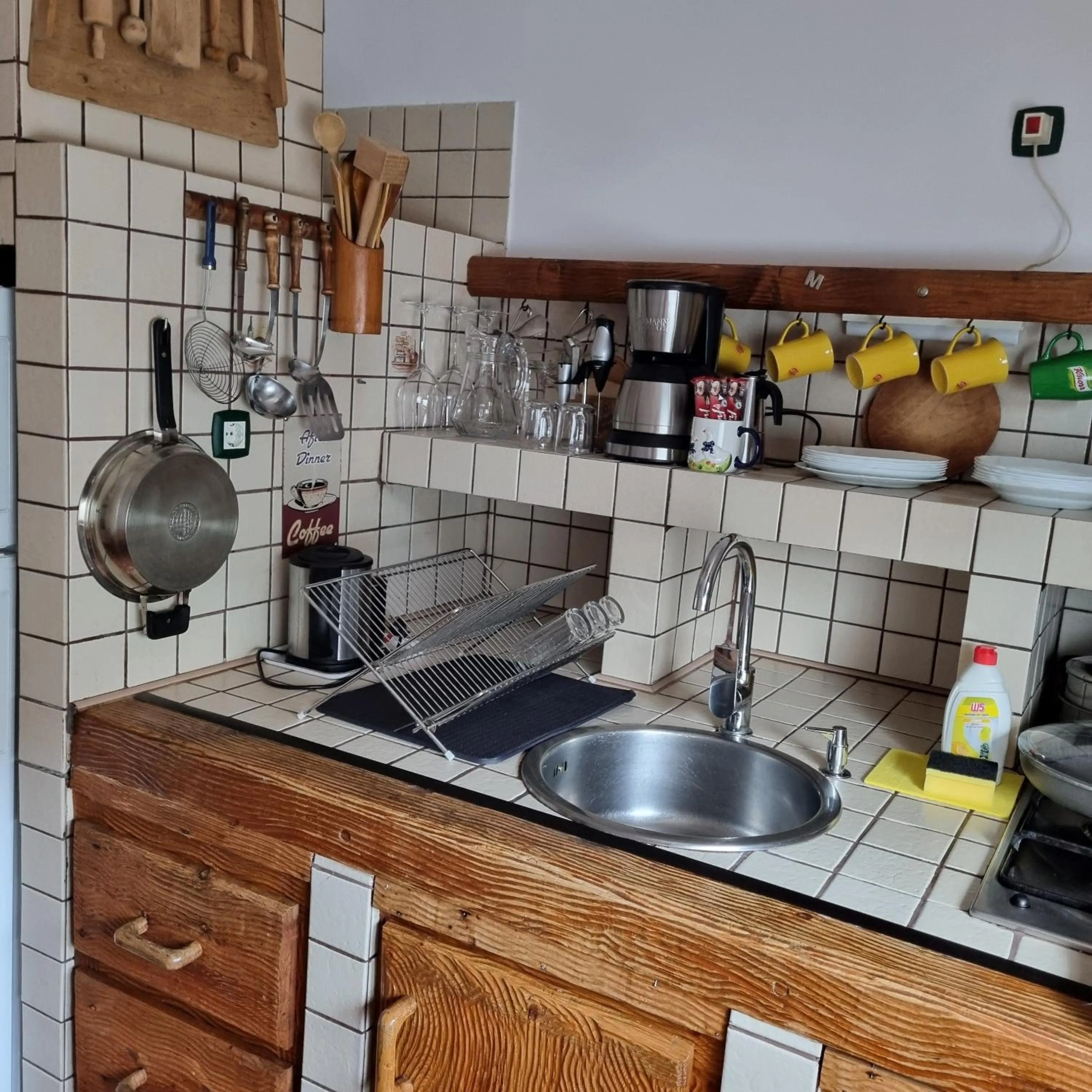 kitchen in Kertvárosi Apartman