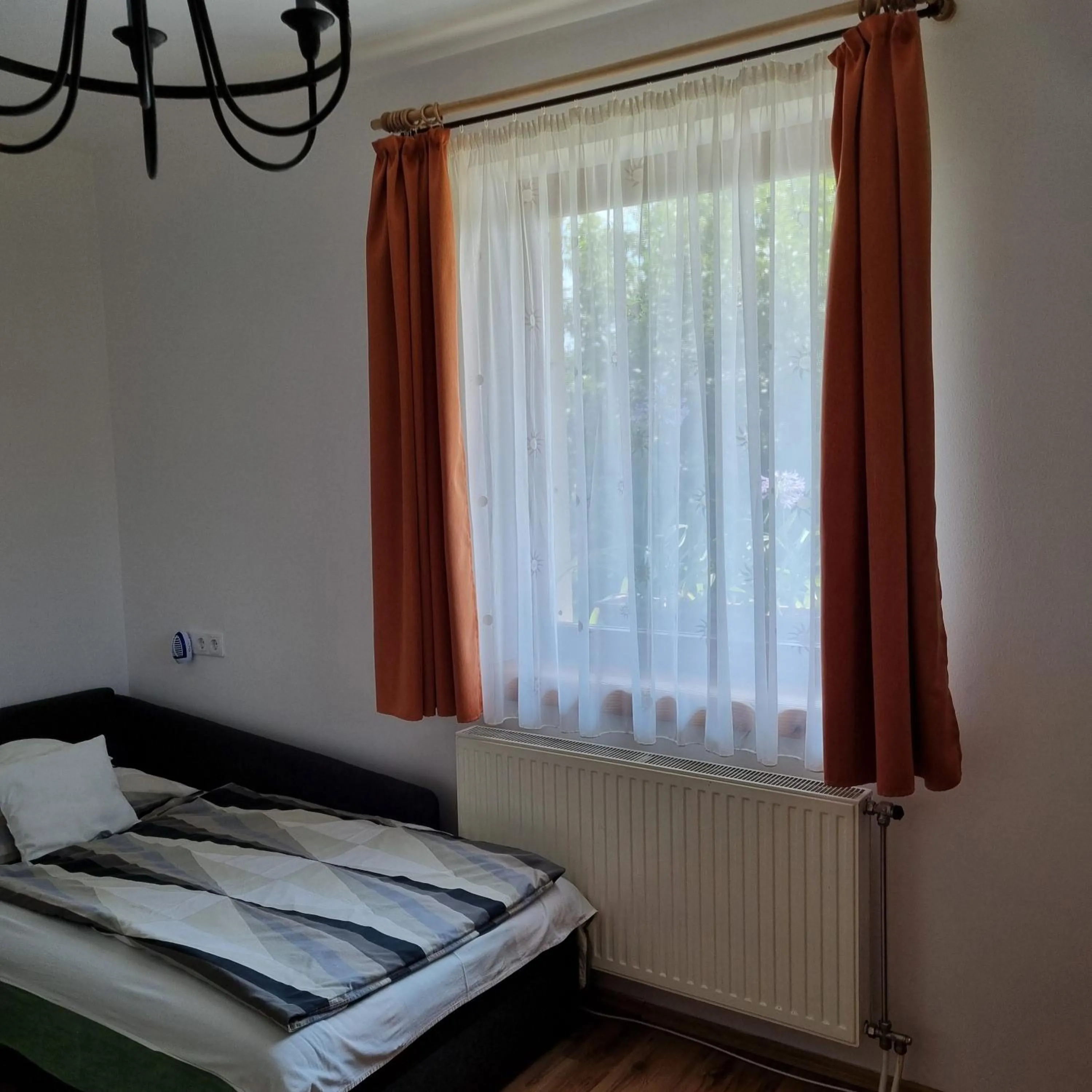 Photo of the whole room, Bed in Kertvárosi Apartman