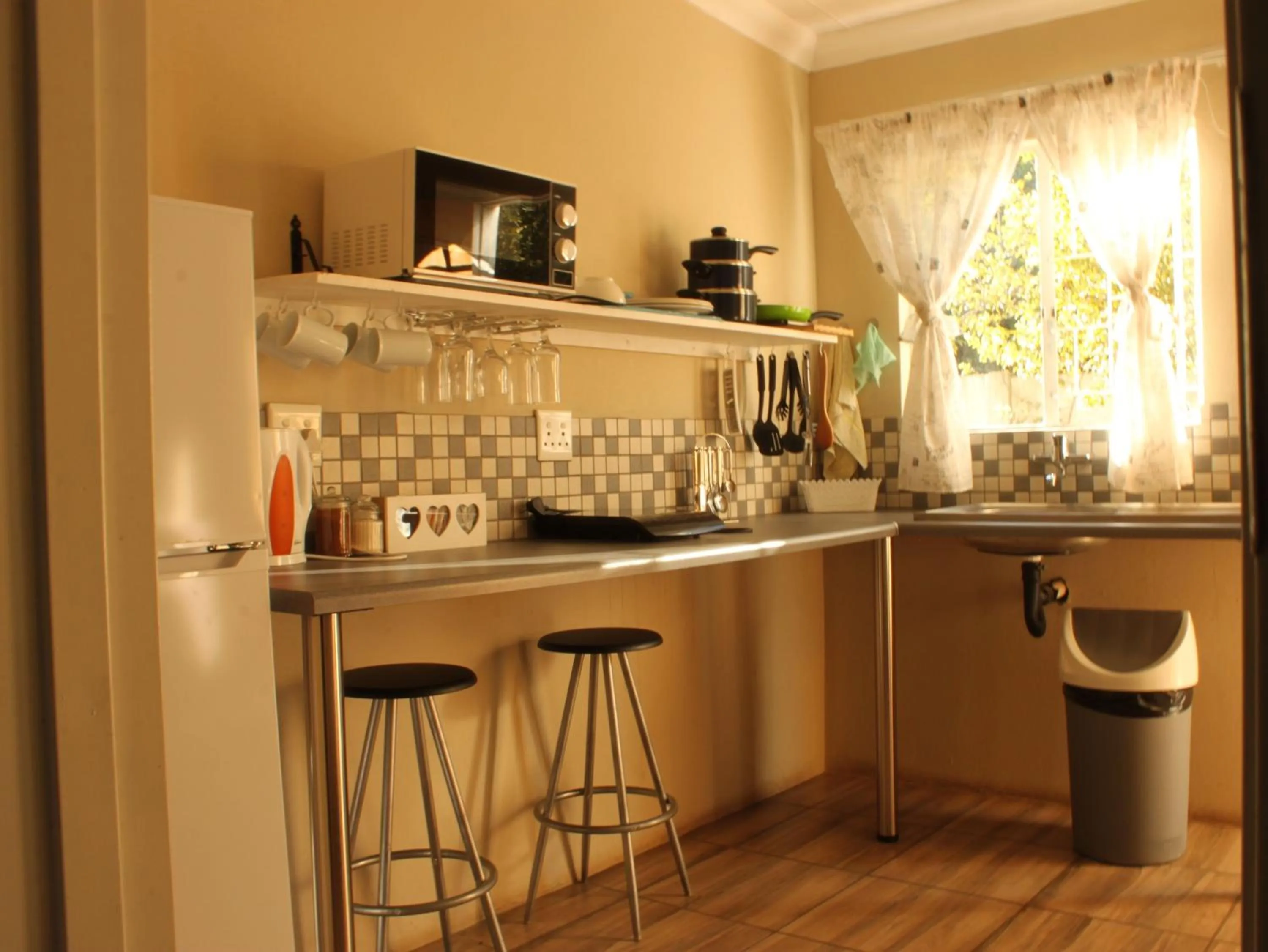 Kitchen or kitchenette in khaya4u Guesthouse