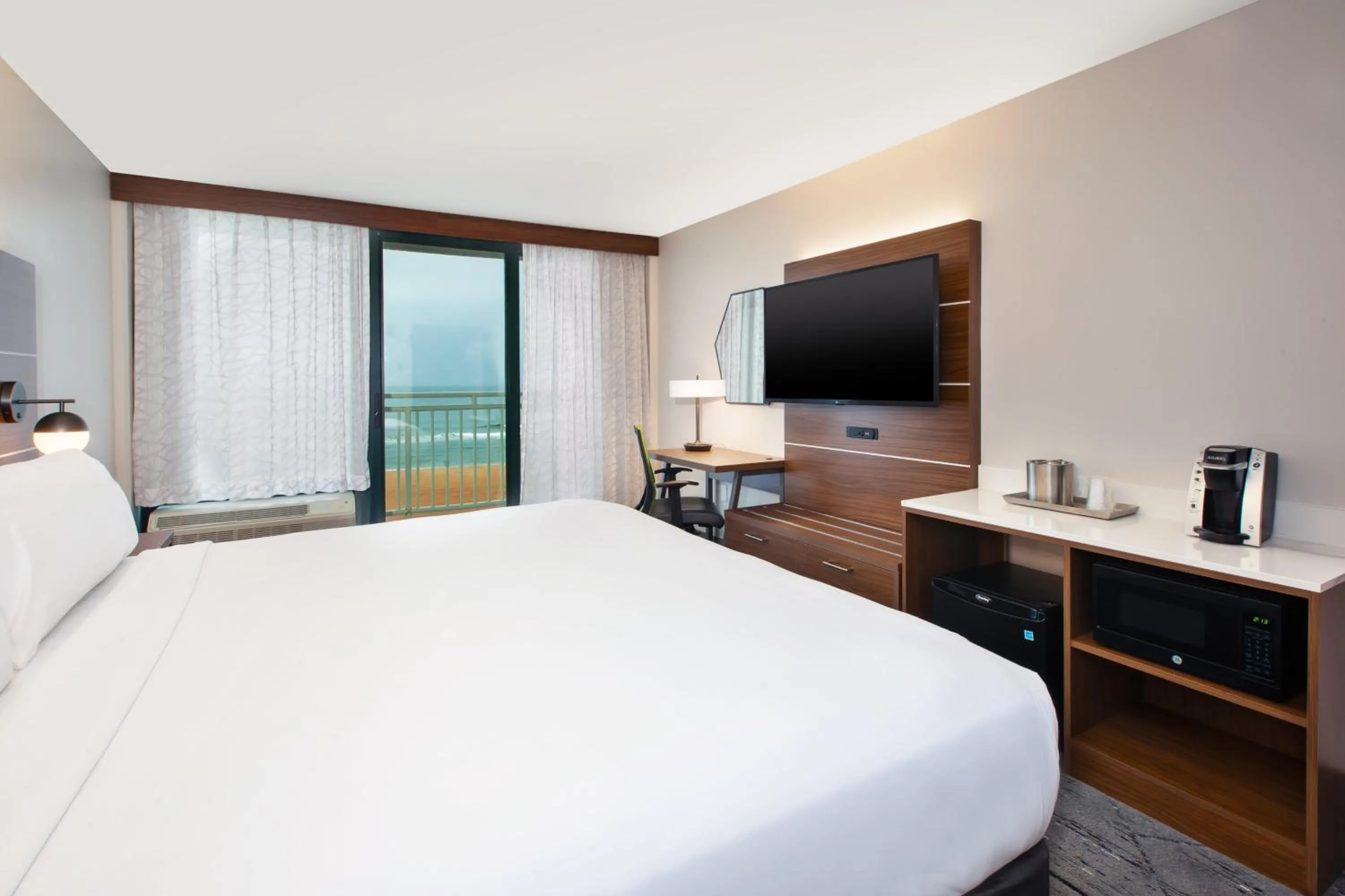 Photo of the whole room, Bed in Holiday Inn Express & Suites VA Beach Oceanfront by IHG