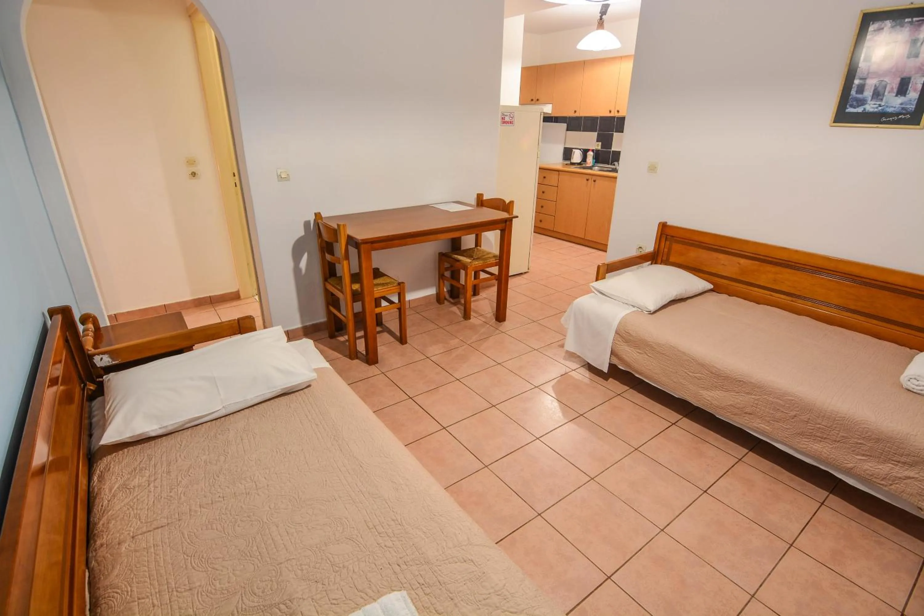 Bed in Epavlis Apartments