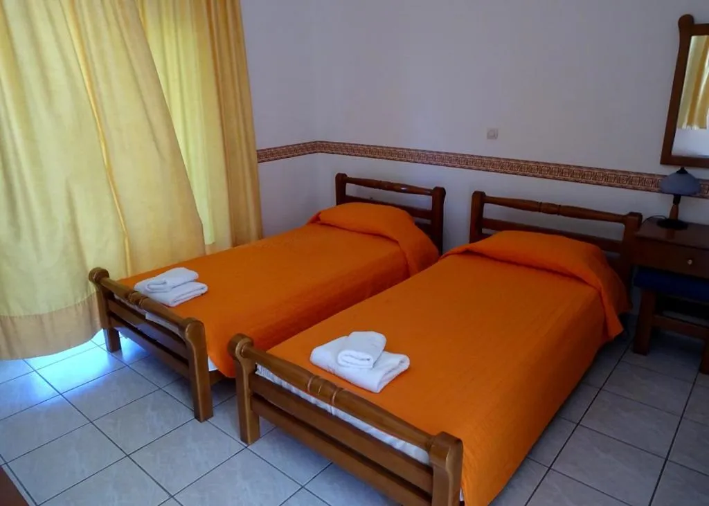 Bed in Epavlis Apartments