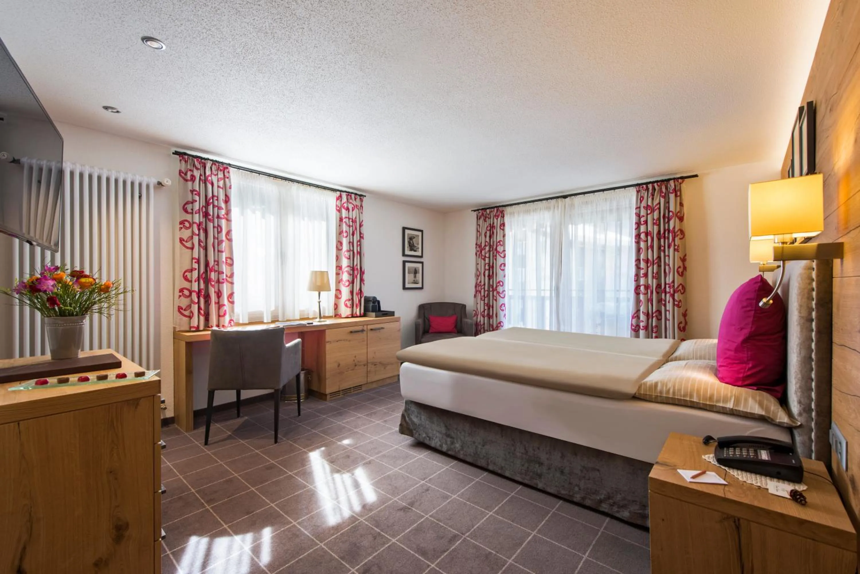 Photo of the whole room, Bed in Chesa Valese by Sisters Zermatt