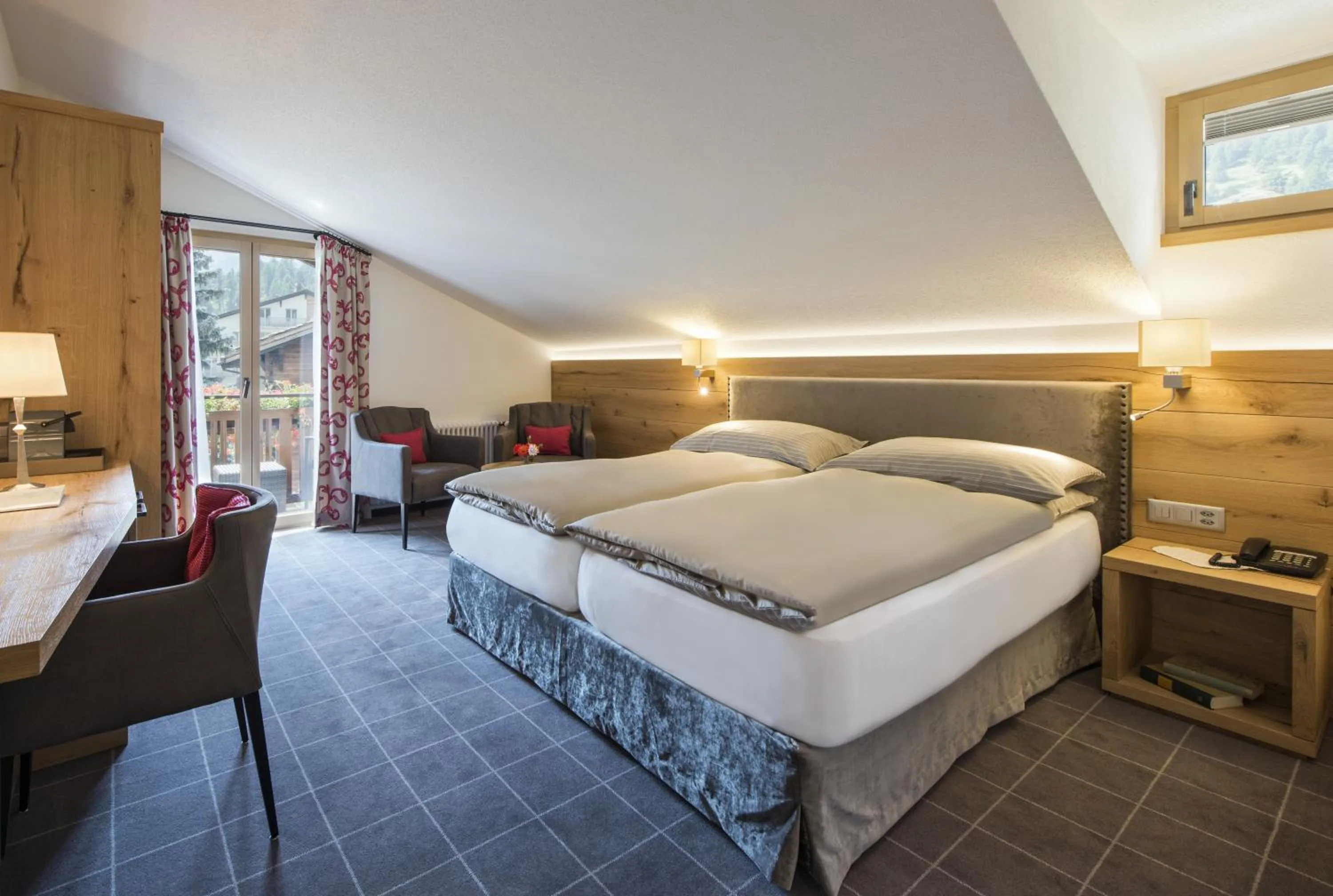 Photo of the whole room, Bed in Chesa Valese by Sisters Zermatt