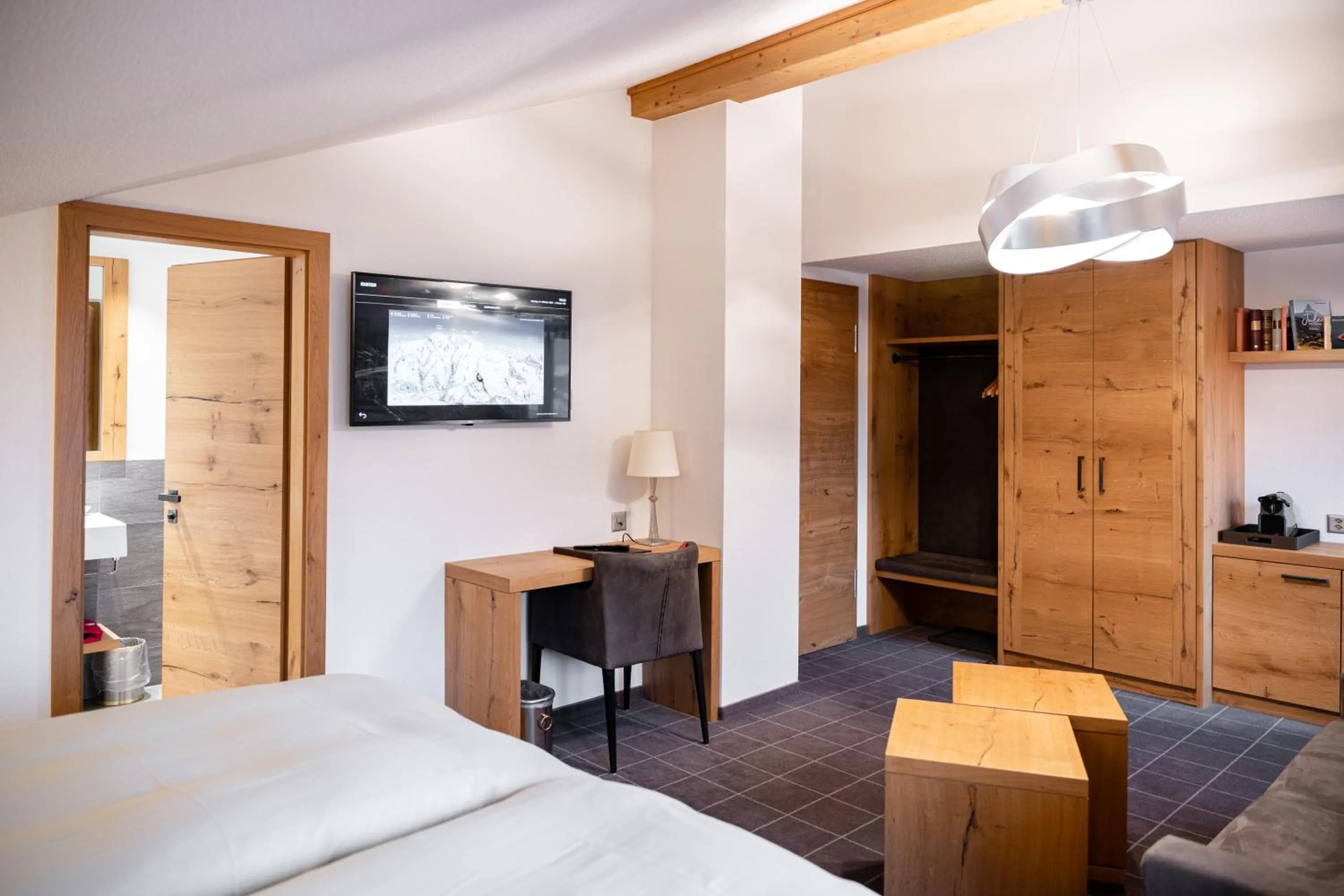 Photo of the whole room, Bed in Chesa Valese by Sisters Zermatt