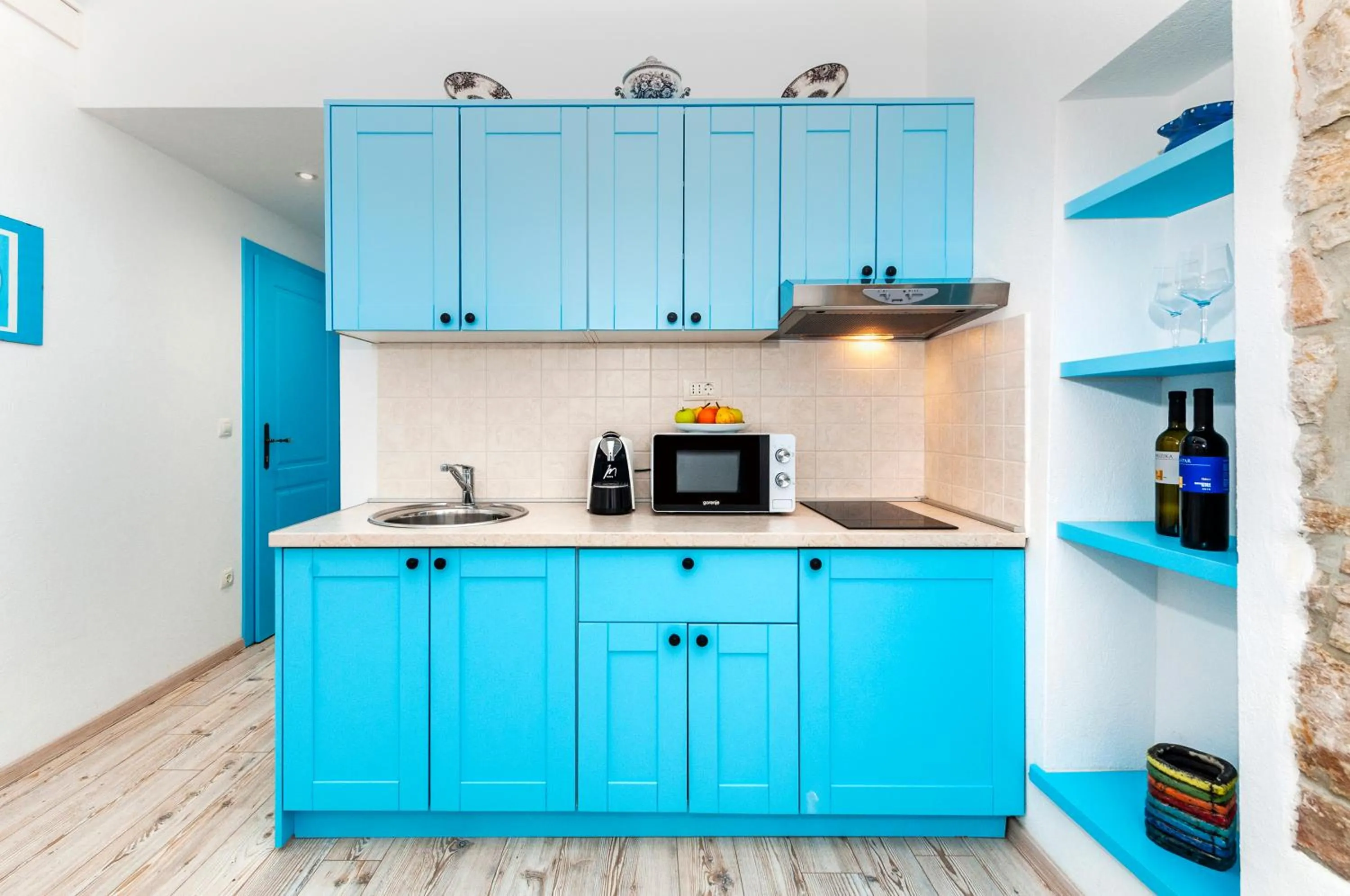 Kitchen or kitchenette in Apartments & Rooms La casa Barbaro
