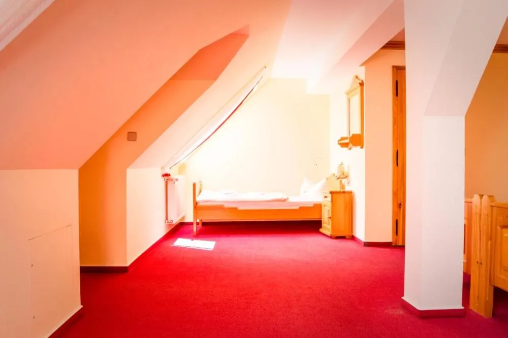 Photo of the whole room, Bed in Hotel Schloßblick Trebsen