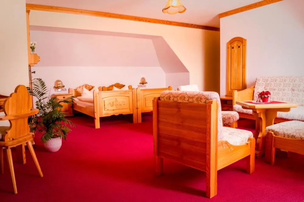Photo of the whole room, Bed in Hotel Schloßblick Trebsen