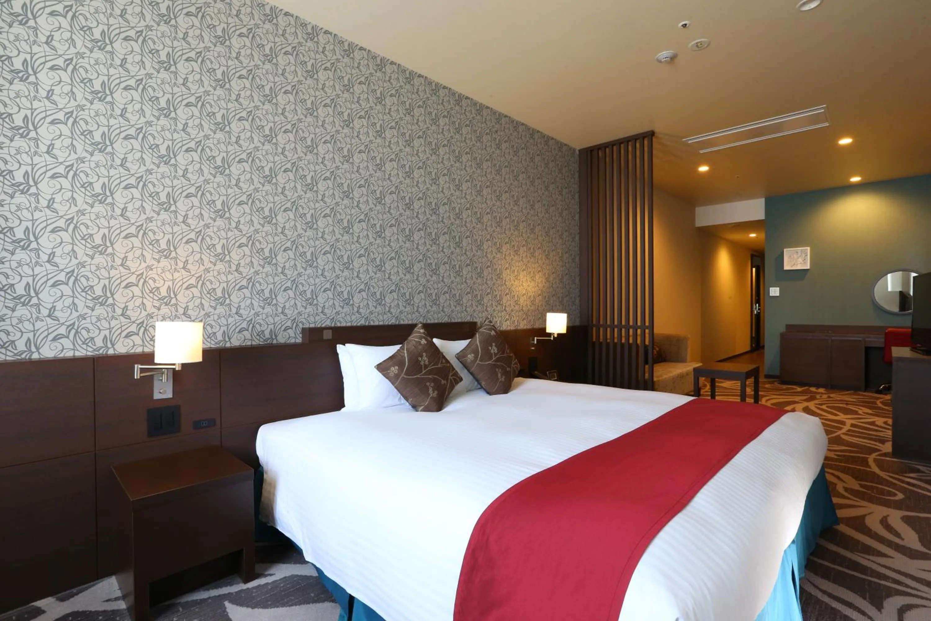 Bed in Hotel La Raison Osaka