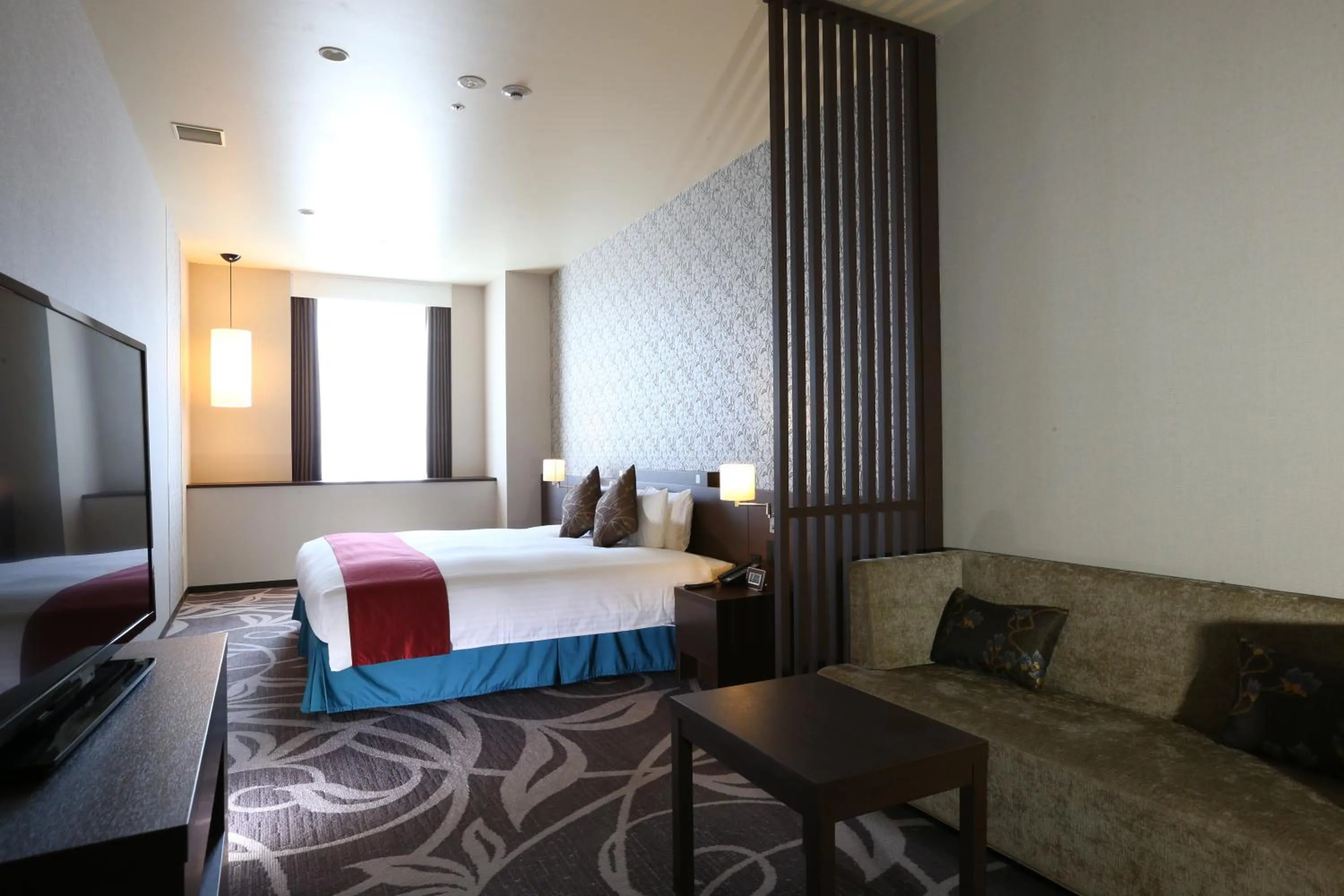 Photo of the whole room, Bed in Hotel La Raison Osaka