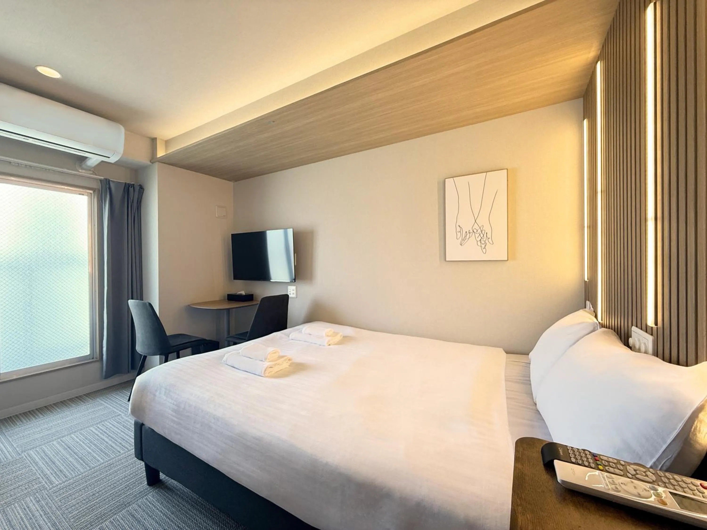 Bed in Osaka Ebisu Hotel