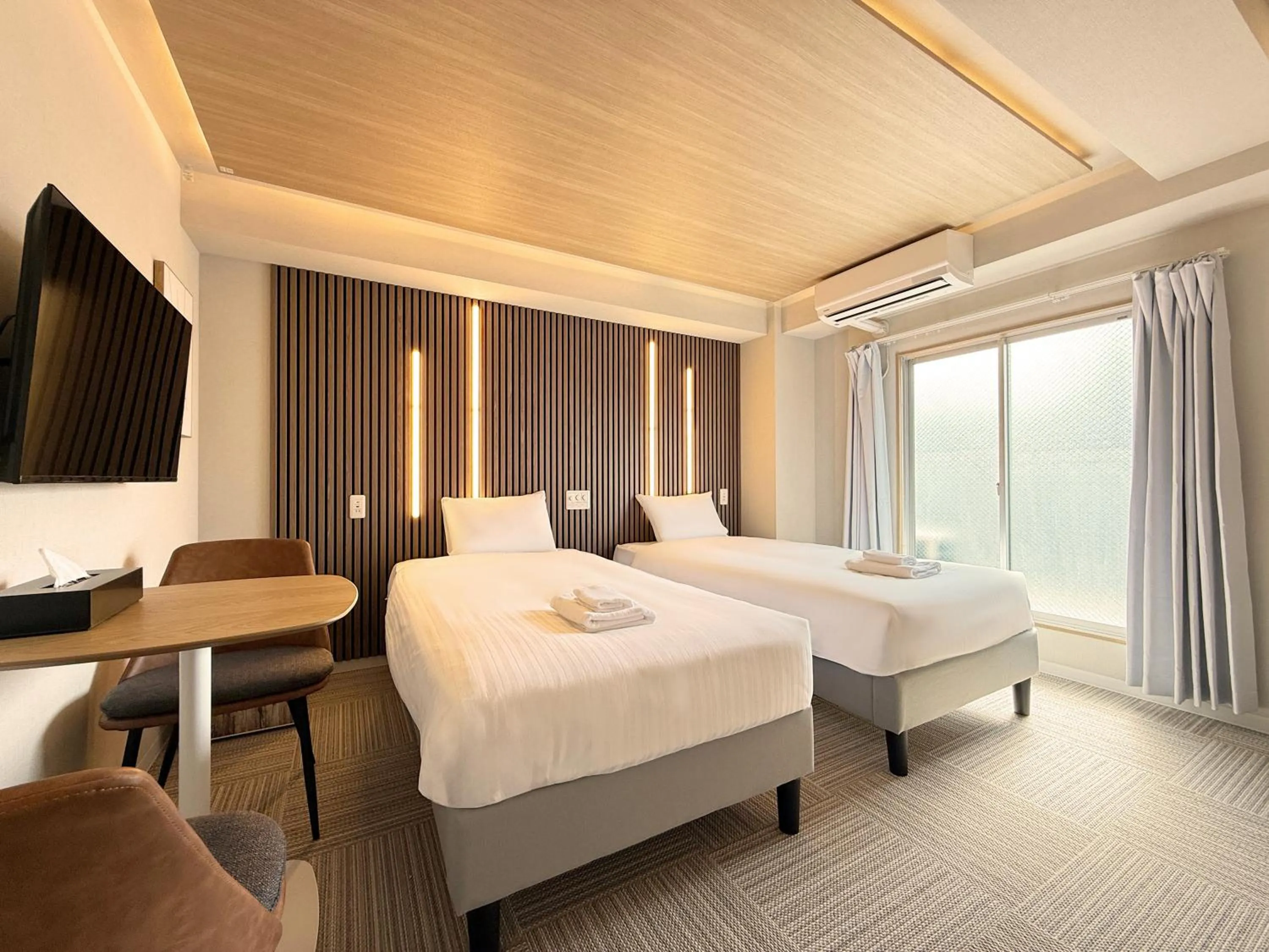 Bed in Osaka Ebisu Hotel