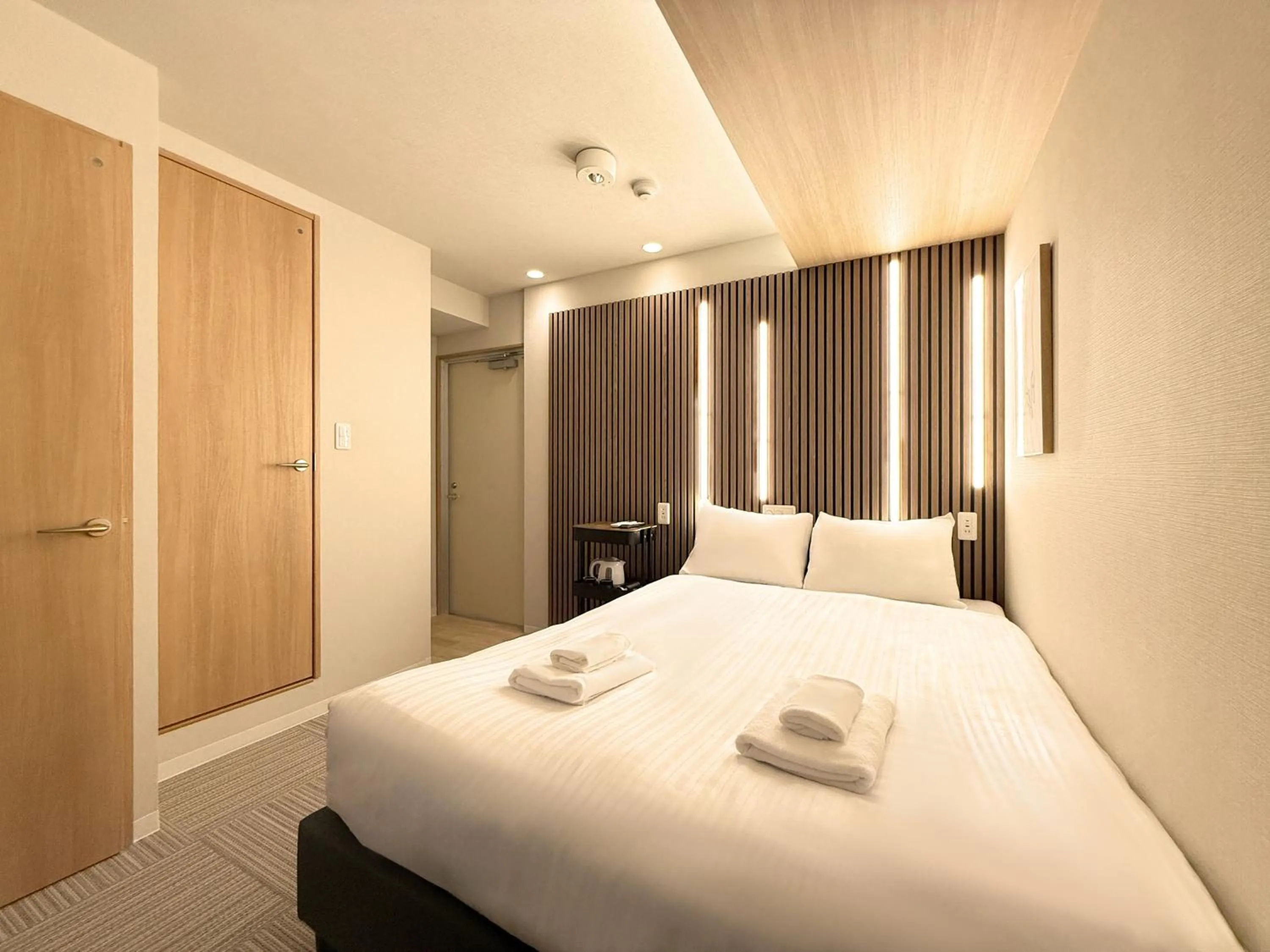 Bed in Osaka Ebisu Hotel