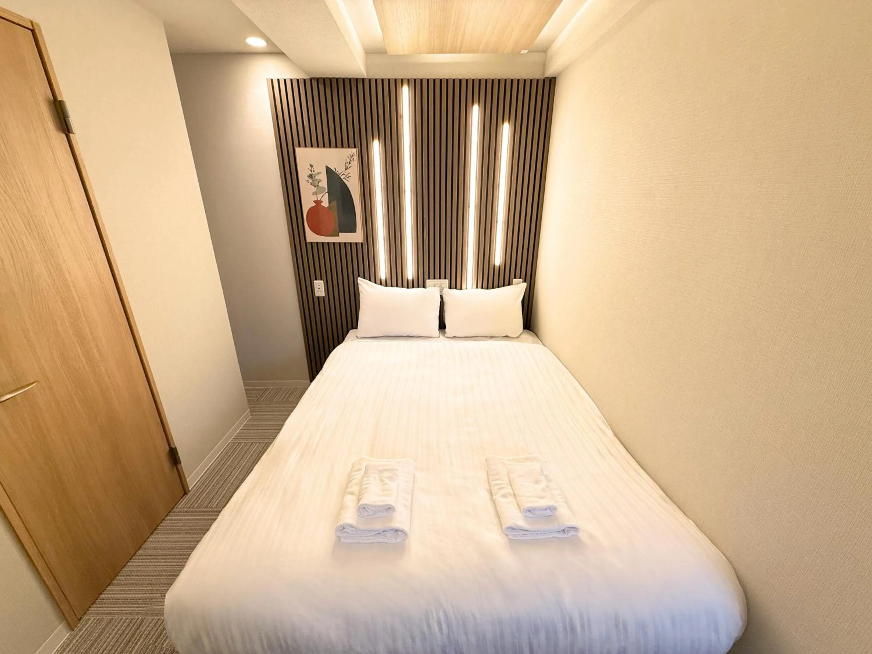 Bed in Osaka Ebisu Hotel