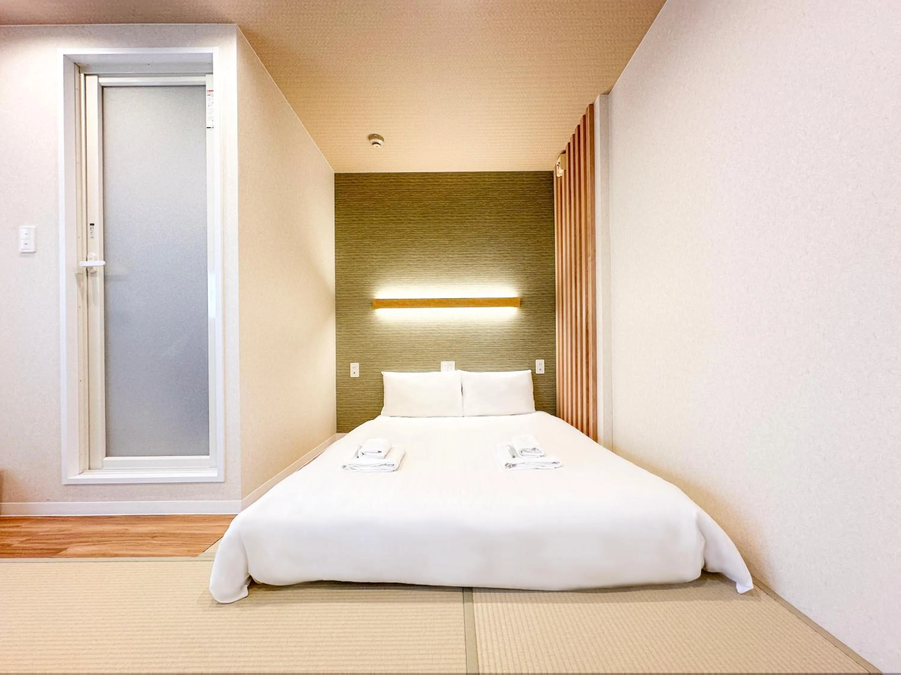 Bed in Osaka Ebisu Hotel