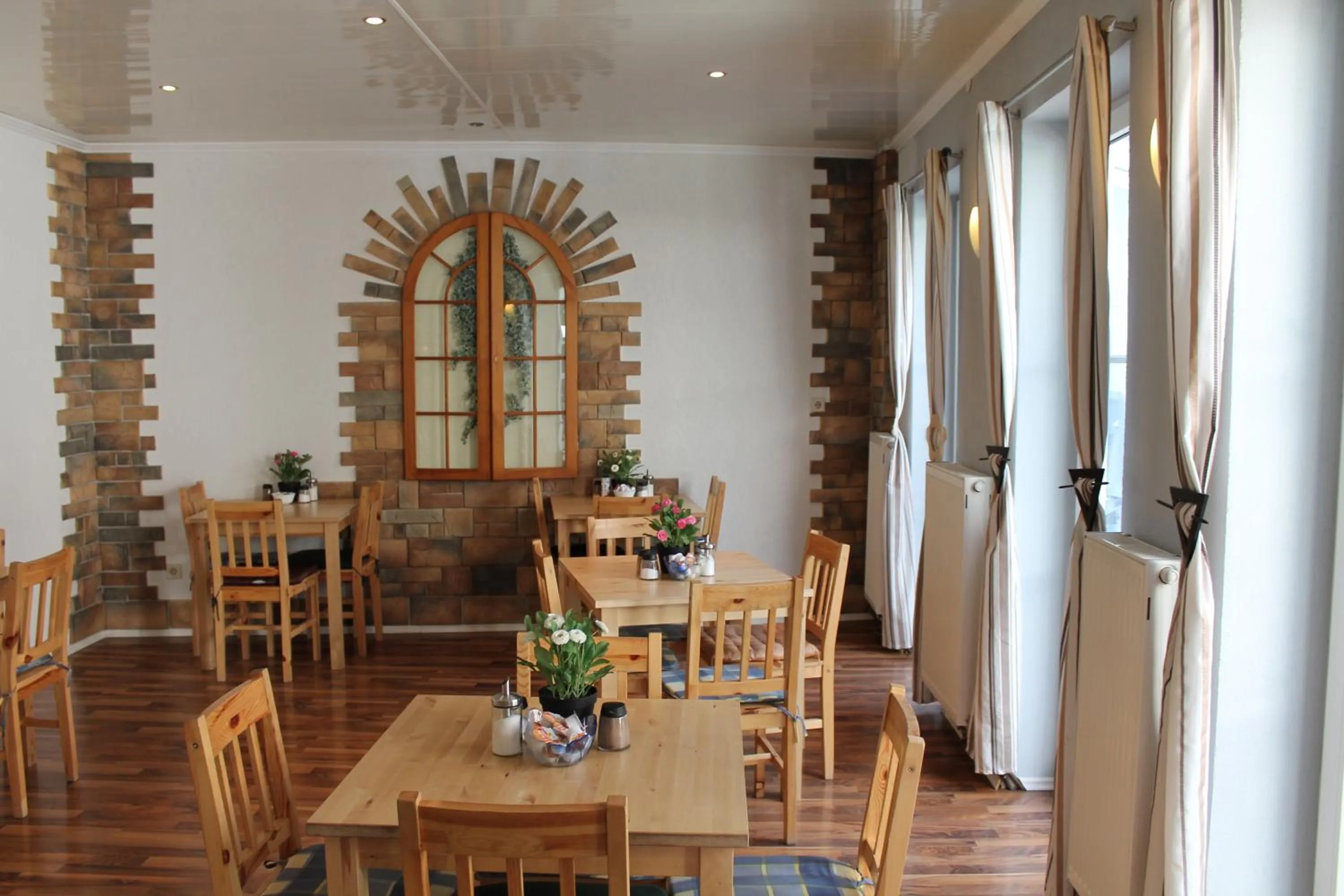 Dining area in Pension Central Nuernberg-Fuerth