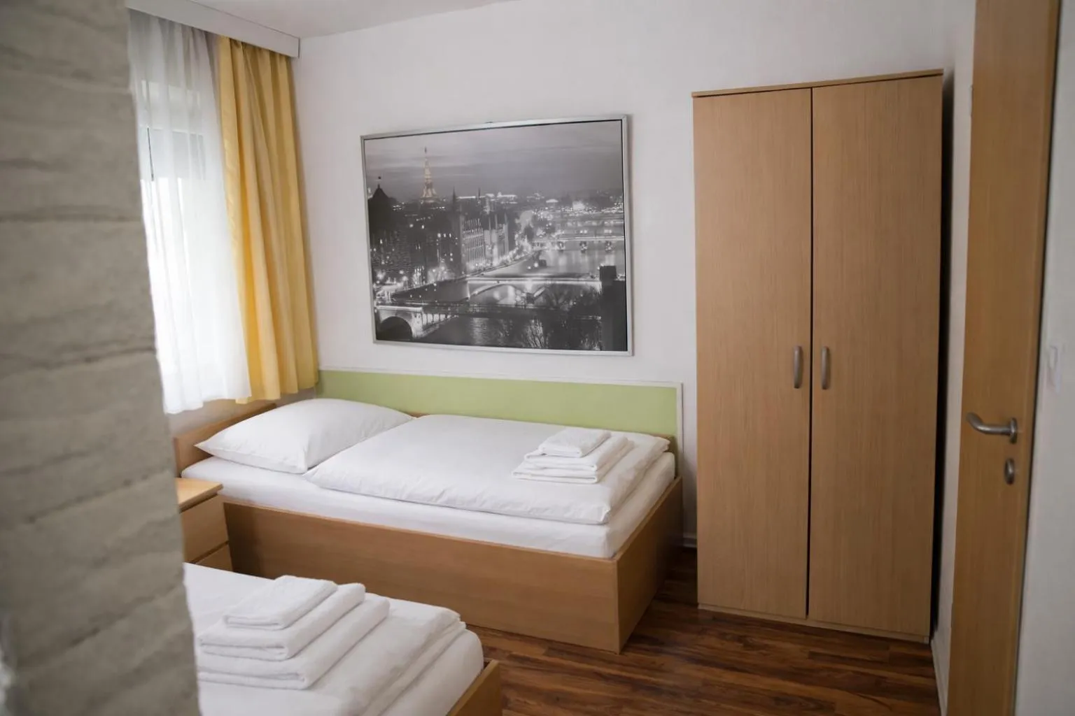 Photo of the whole room, Bed in Pension Central Nuernberg-Fuerth