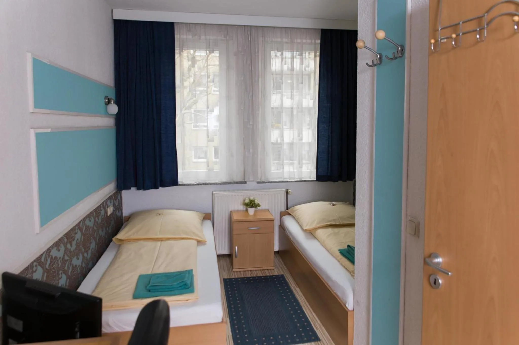 Bed in Pension Central Nuernberg-Fuerth