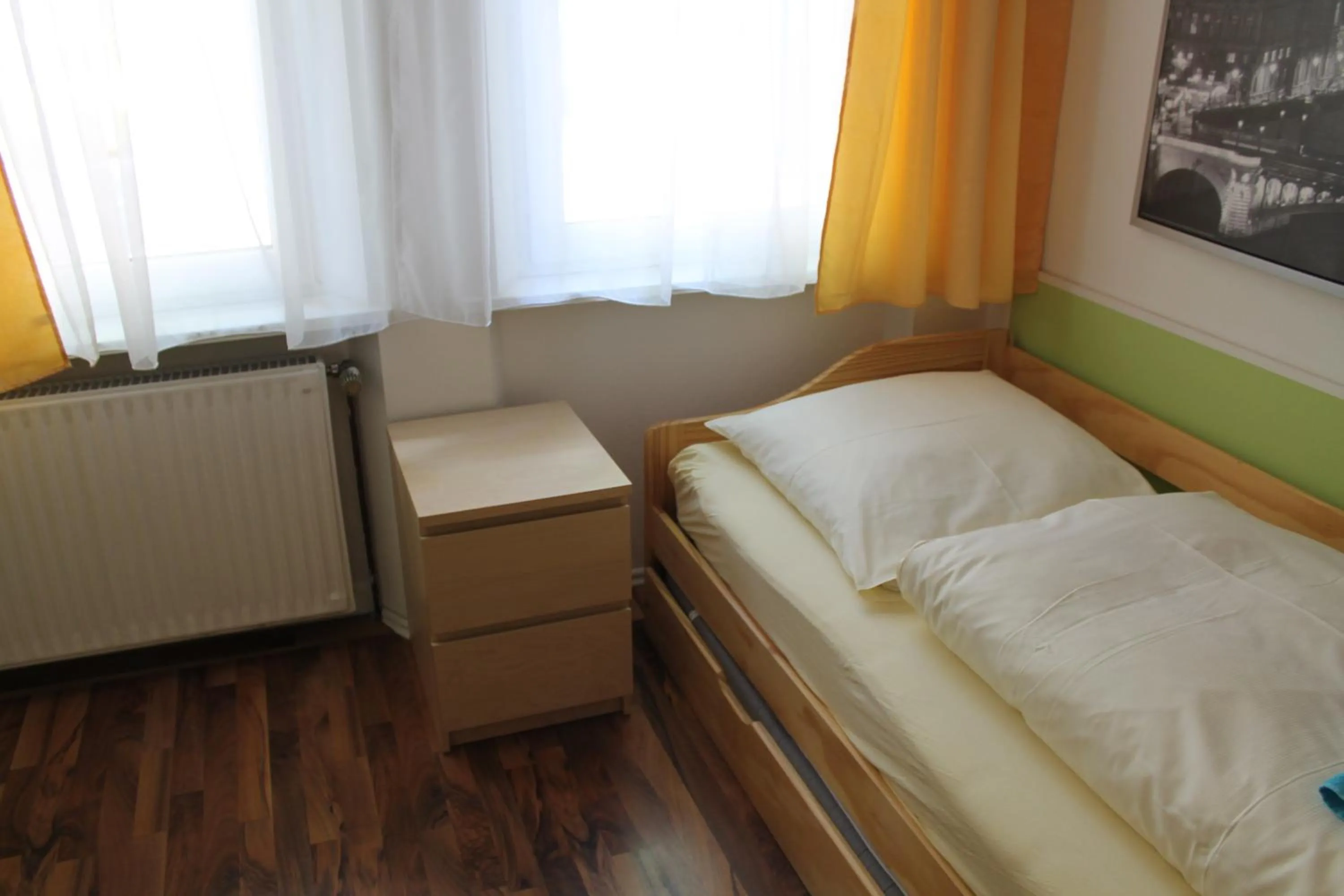 Bed in Pension Central Nuernberg-Fuerth