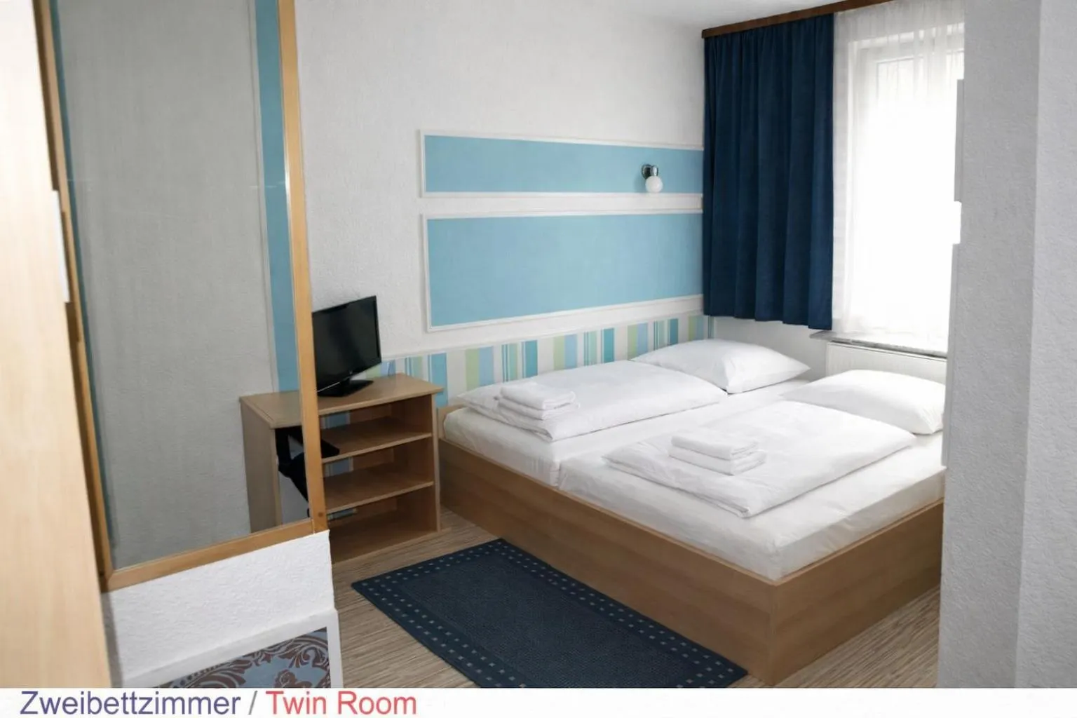 Photo of the whole room, Bed in Pension Central Nuernberg-Fuerth