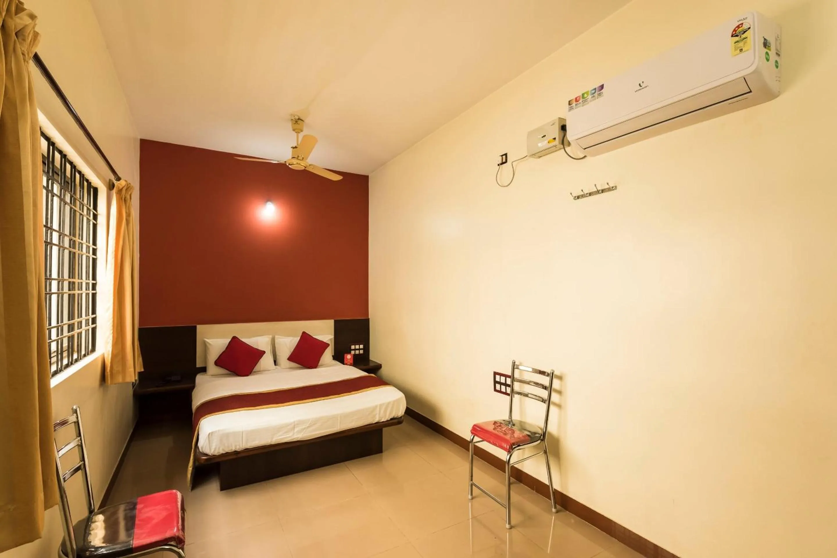 Bedroom in Sai Kalyan suites