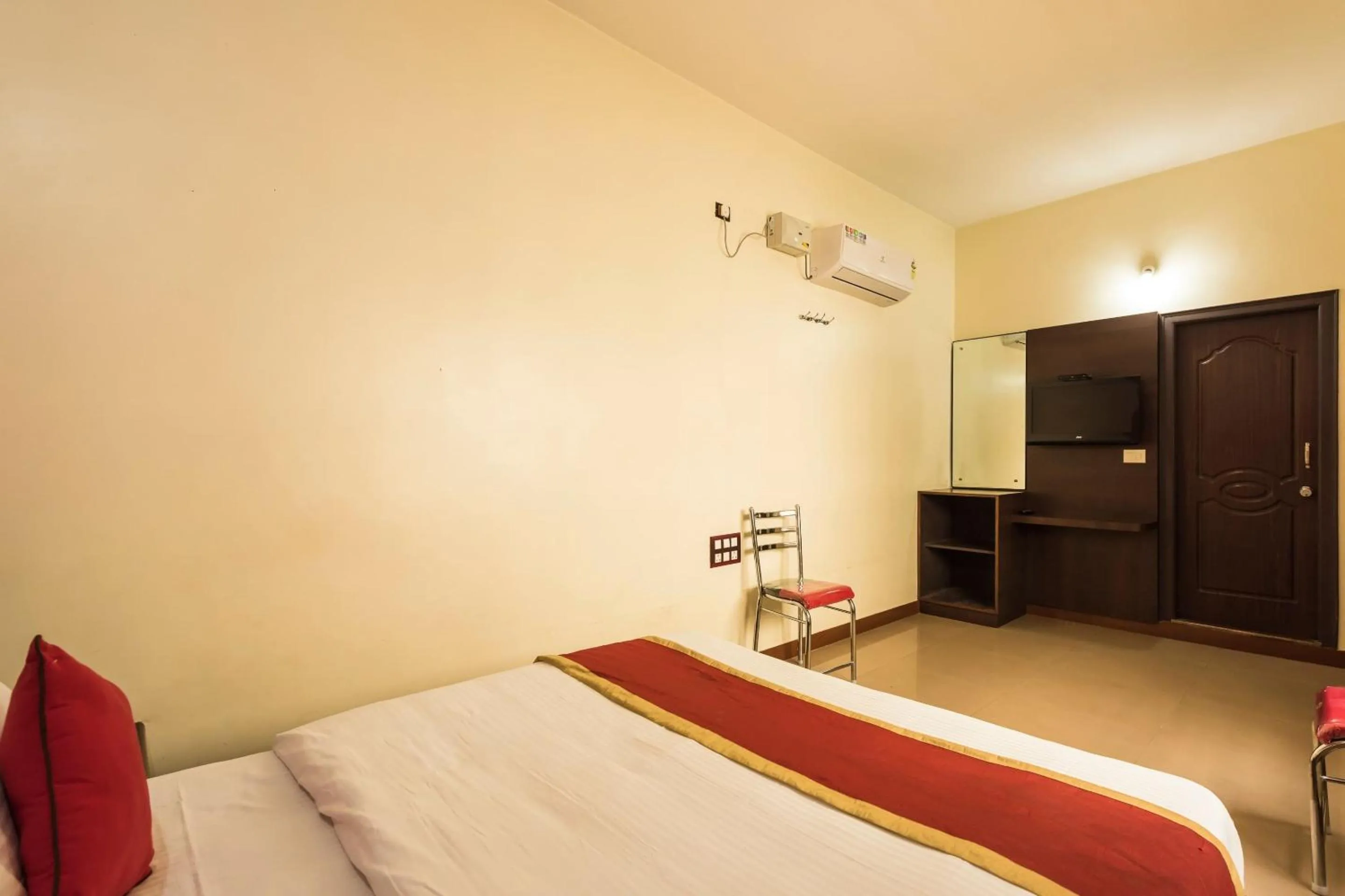 Bedroom in Sai Kalyan suites