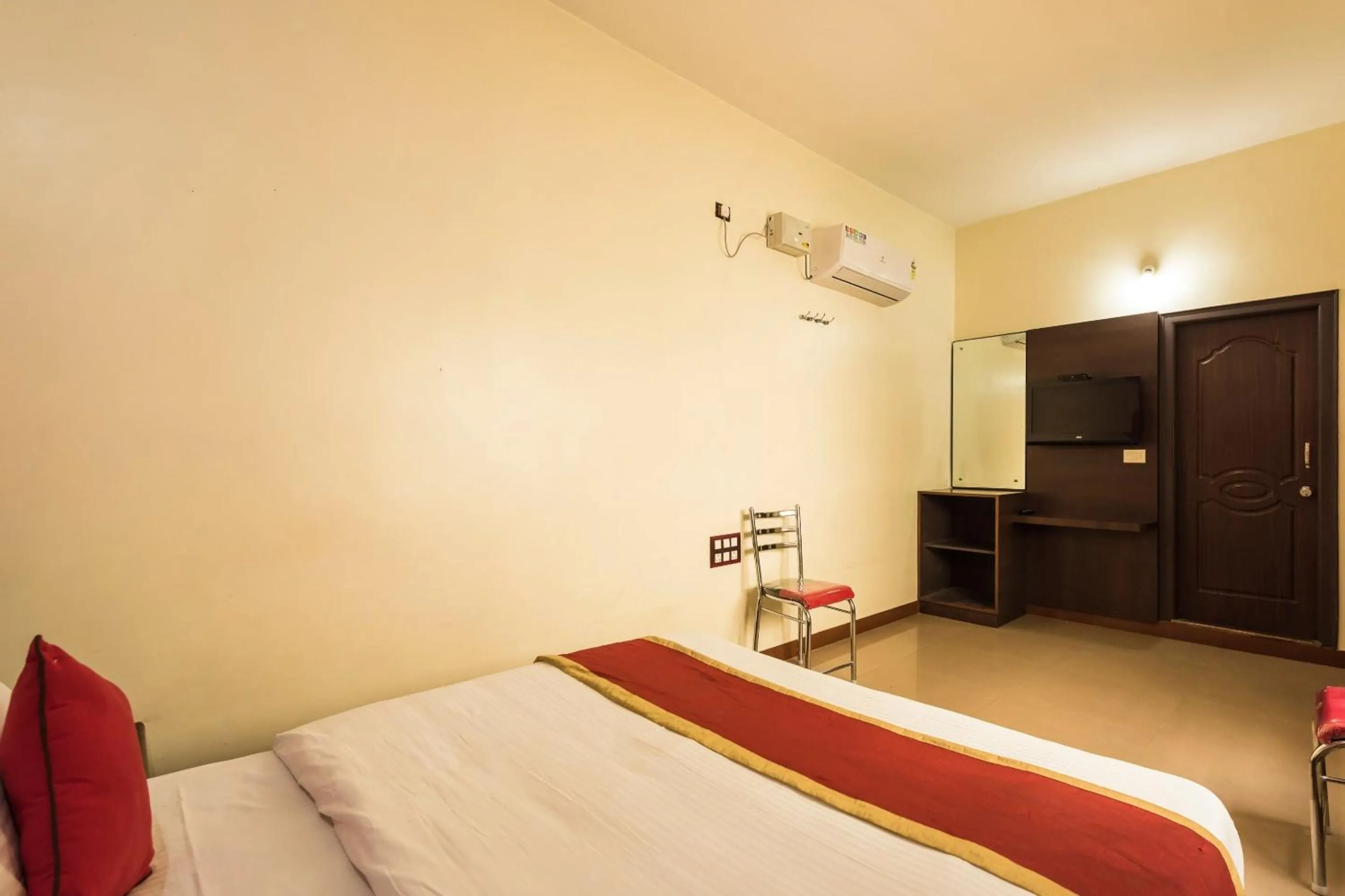 Bedroom in Sai Kalyan suites