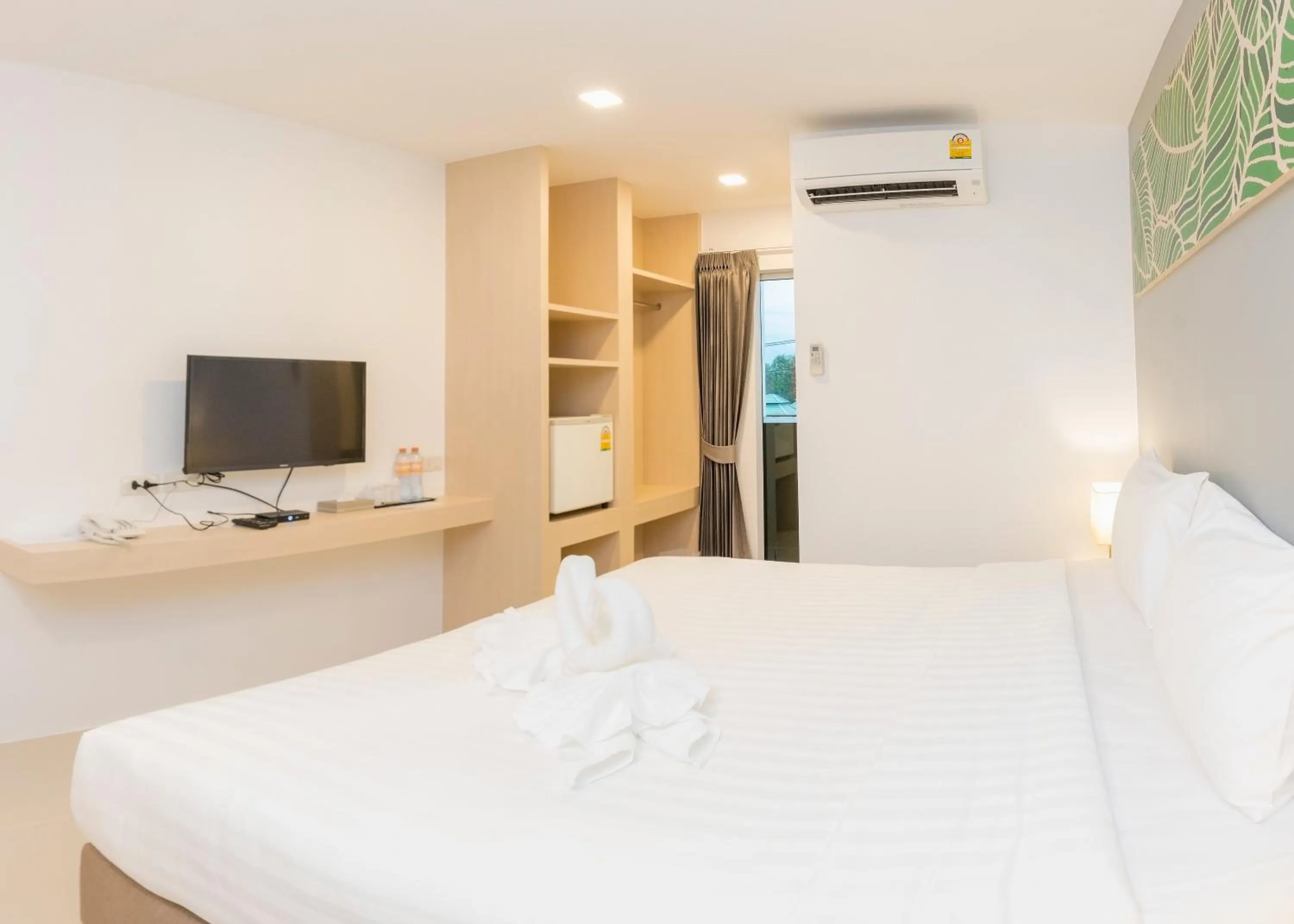 Bedroom in Trat City Hotel