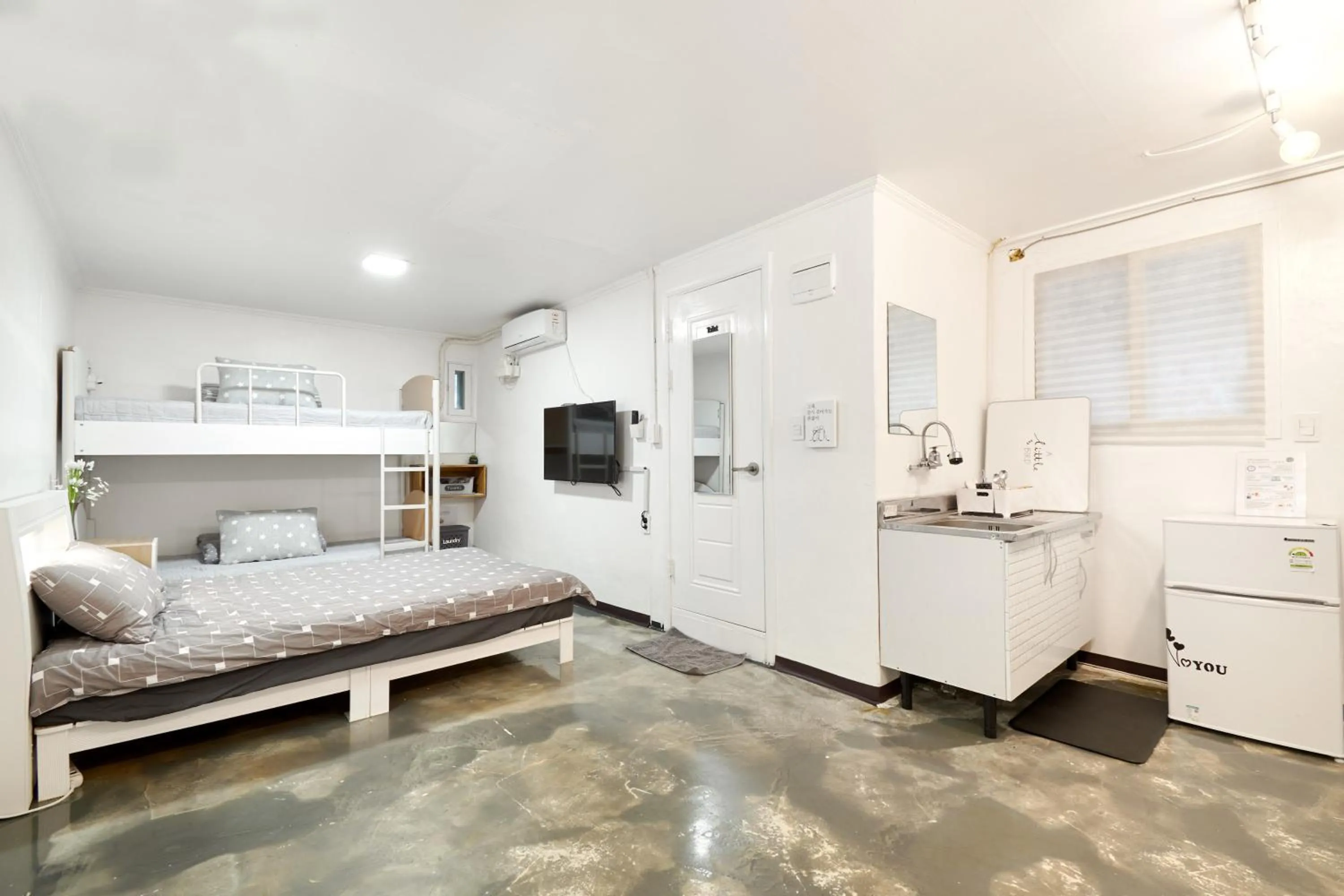 Bed in Jun Guesthouse