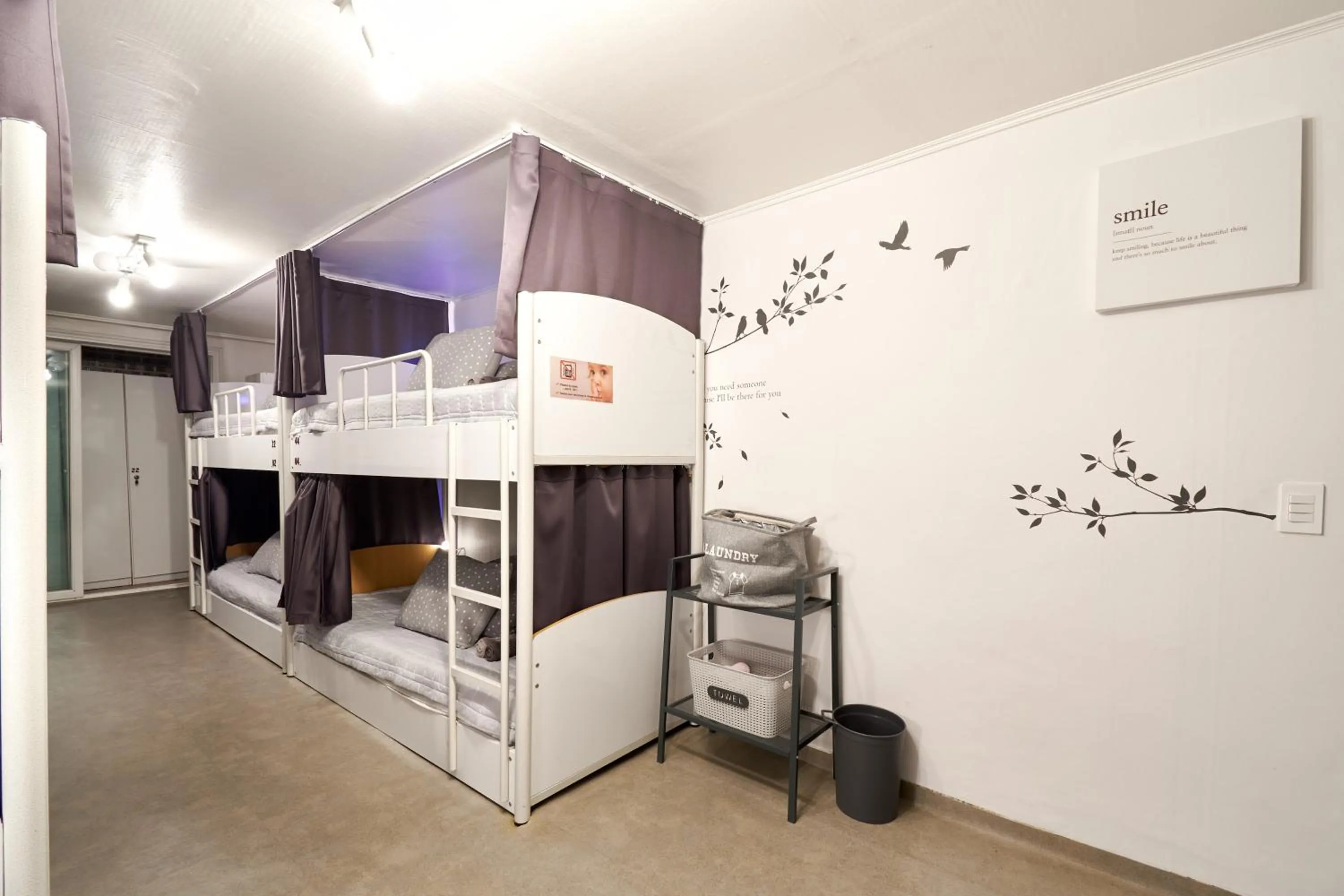 Living room, Bed in Jun Guesthouse