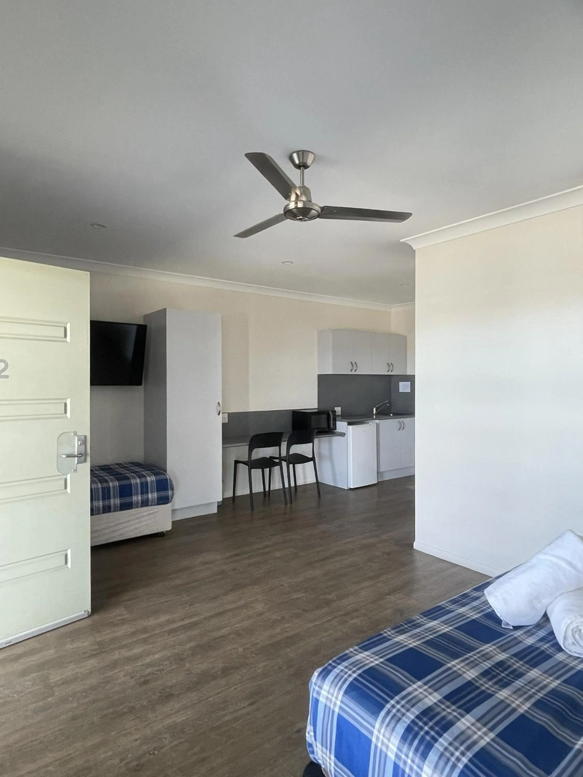 Bed in Reef Gardens Motel