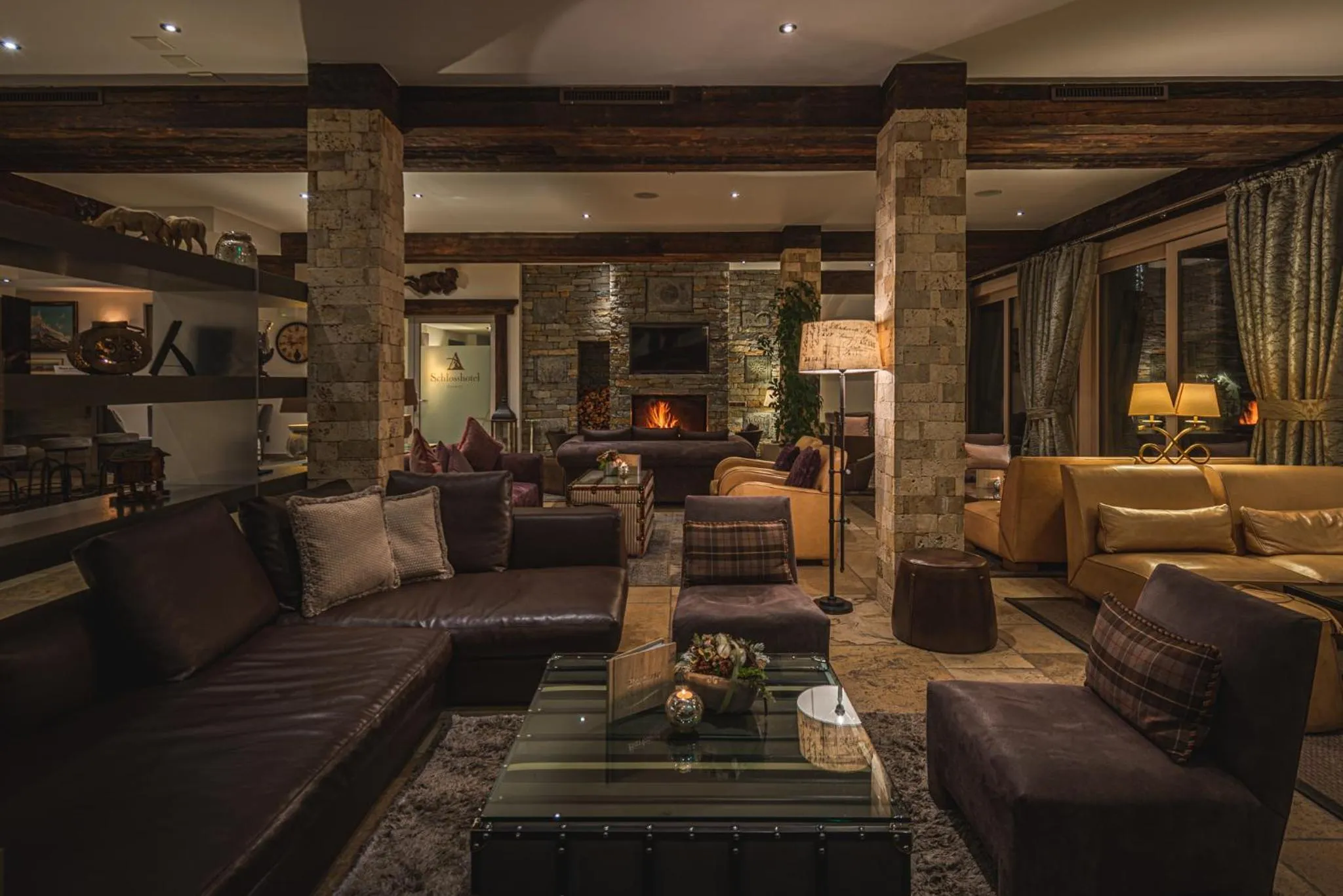 Lounge or bar in SchlossHotel Zermatt Active & CBD Spa Hotel