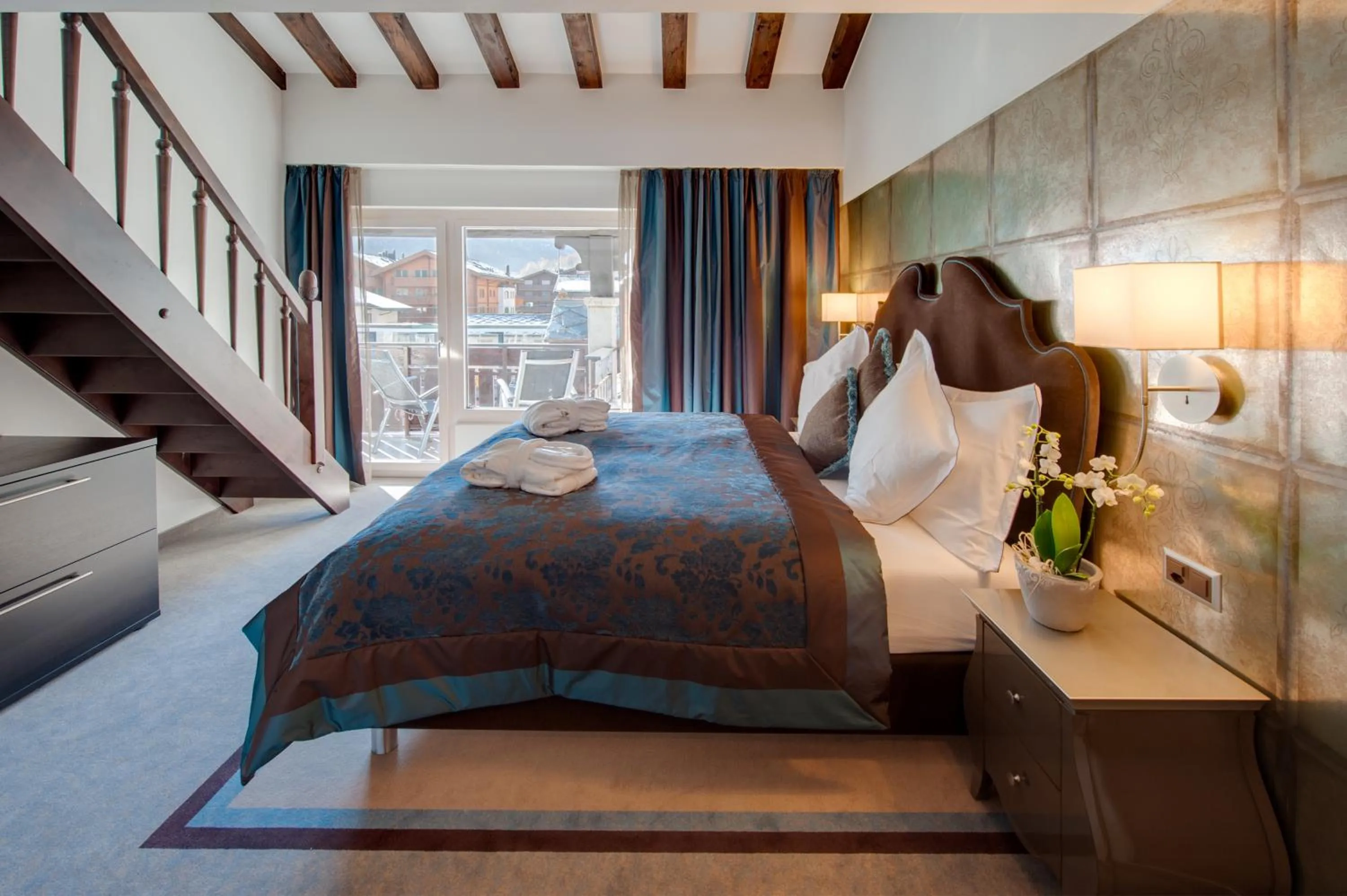 Bed in SchlossHotel Zermatt Active & CBD Spa Hotel