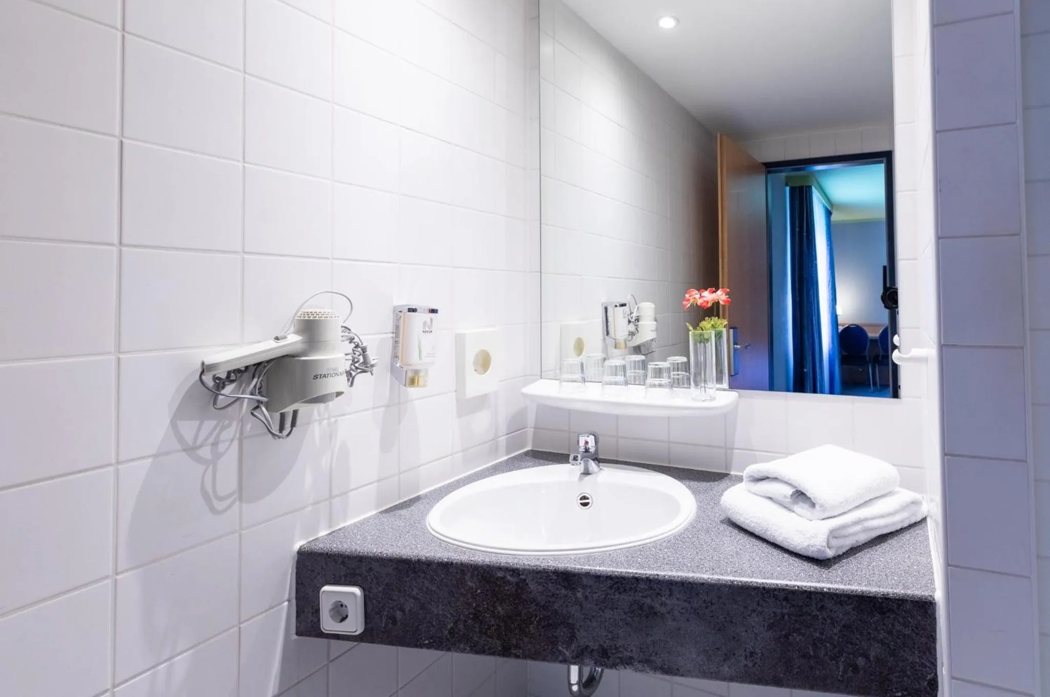 Bathroom in Garner Hotel Cottbus Süd by IHG