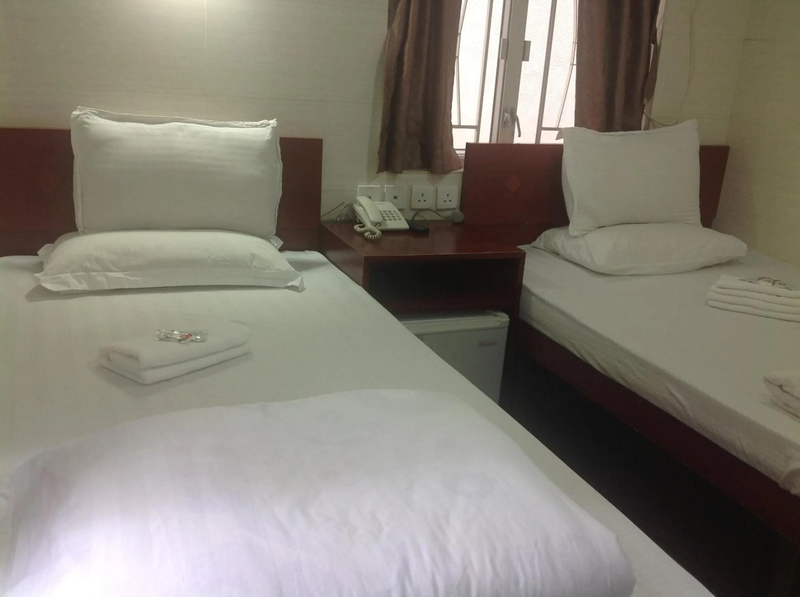 Bed in New Yan Yan Guest House reception 9th floor Flat E4 E6