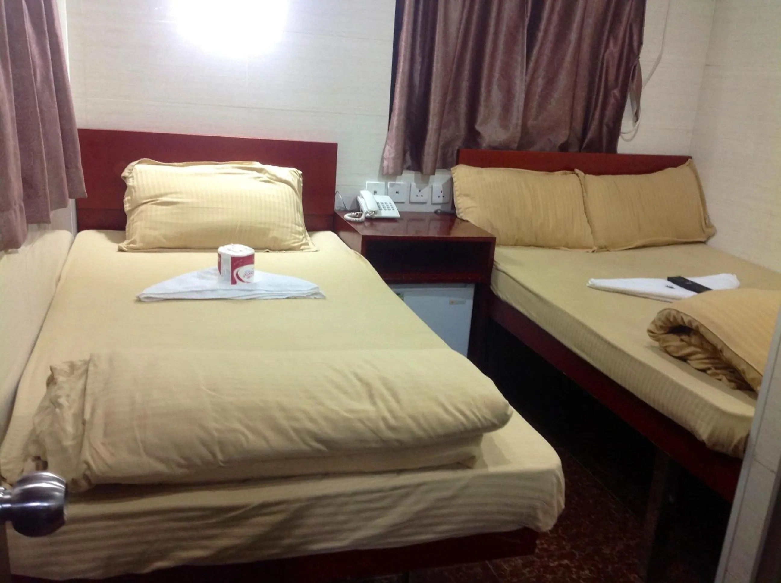 Bed in New Yan Yan Guest House reception 9th floor Flat E4 E6