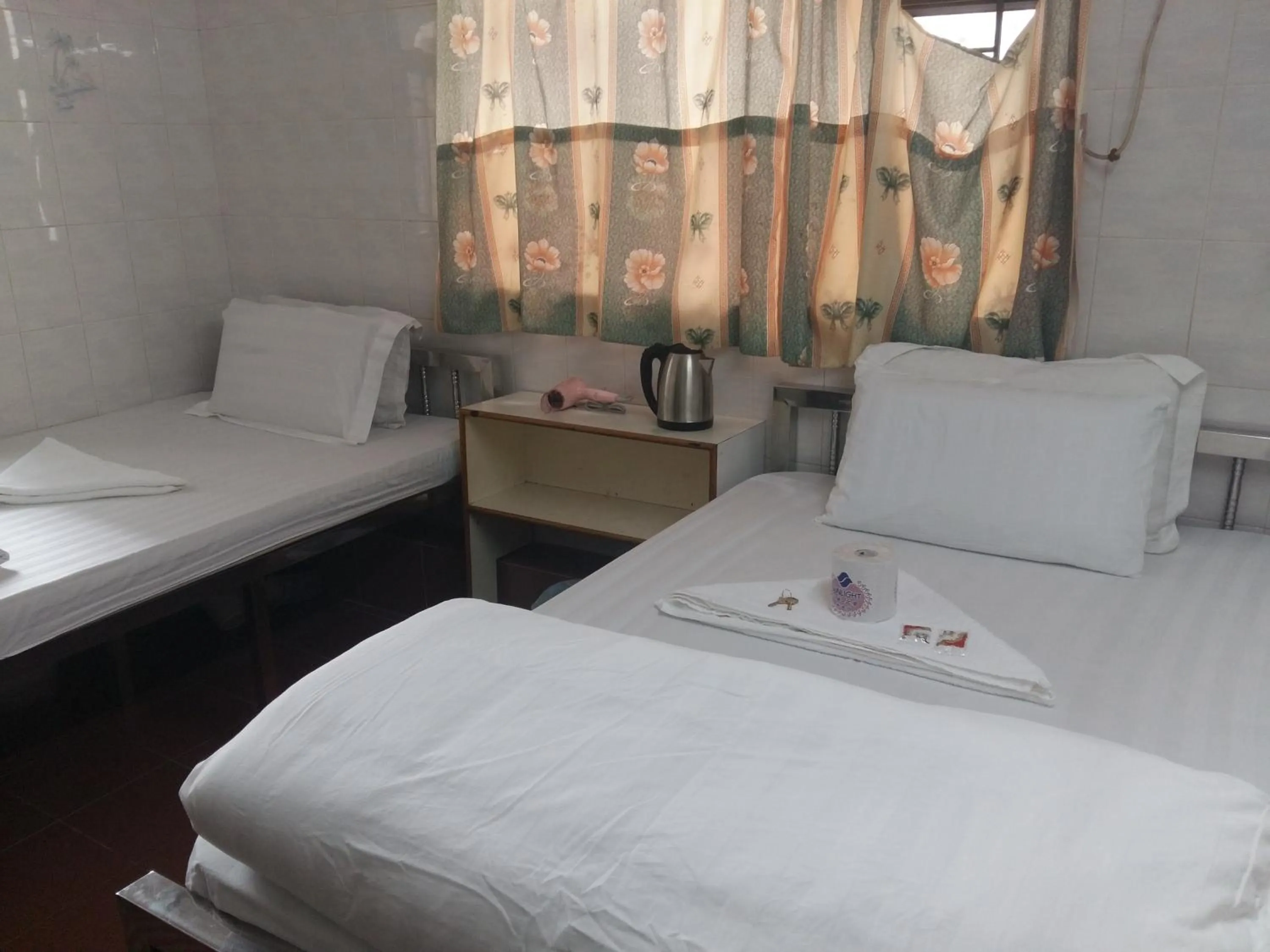 Bed in New Yan Yan Guest House reception 9th floor Flat E4 E6