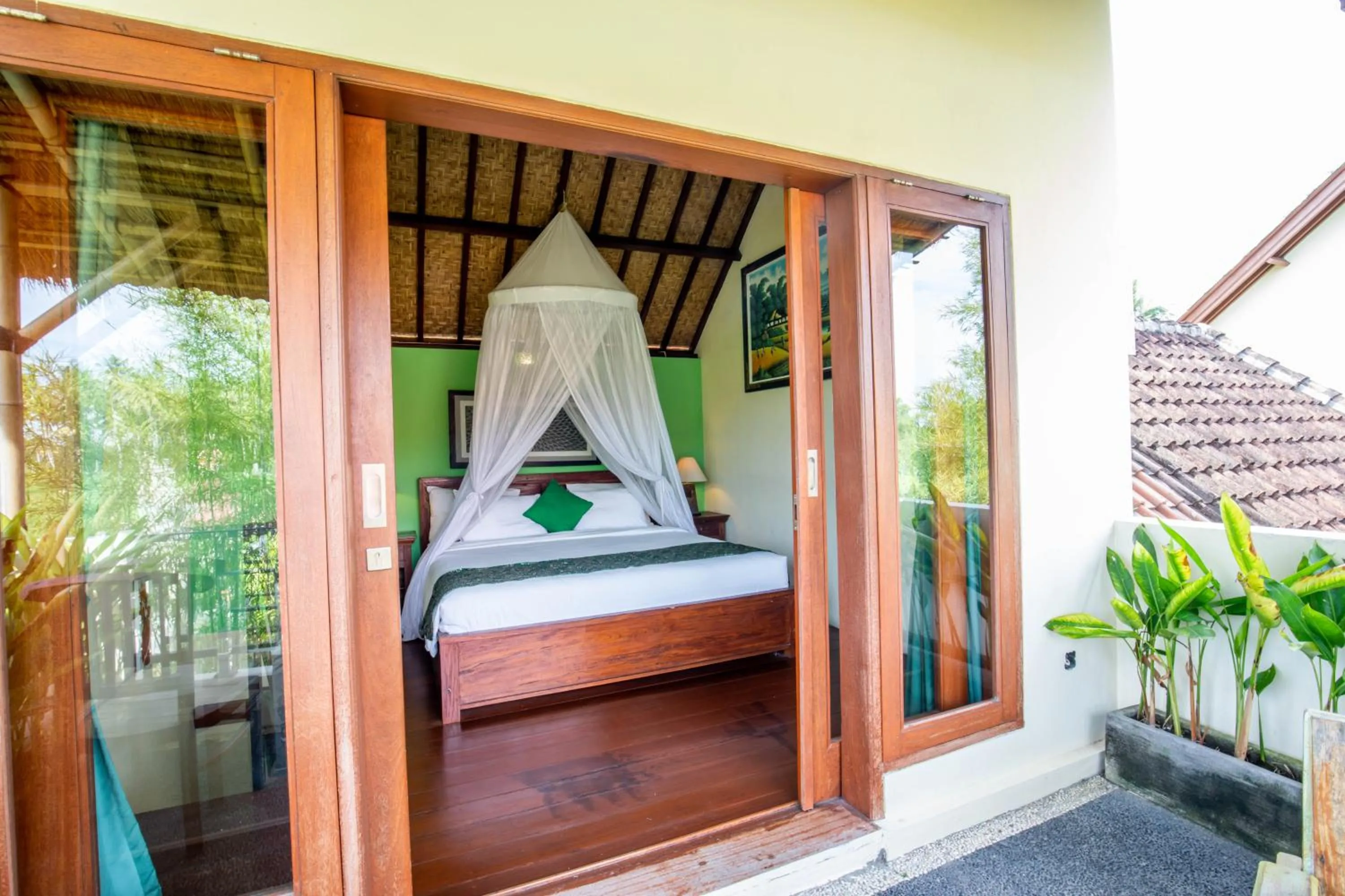 Bed in Sisin Ubud View