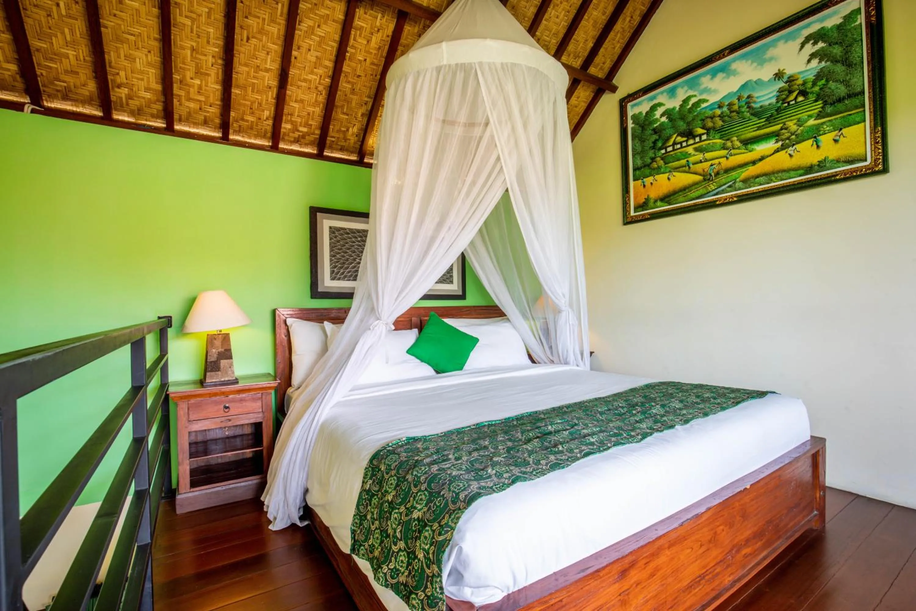 Bed in Sisin Ubud View