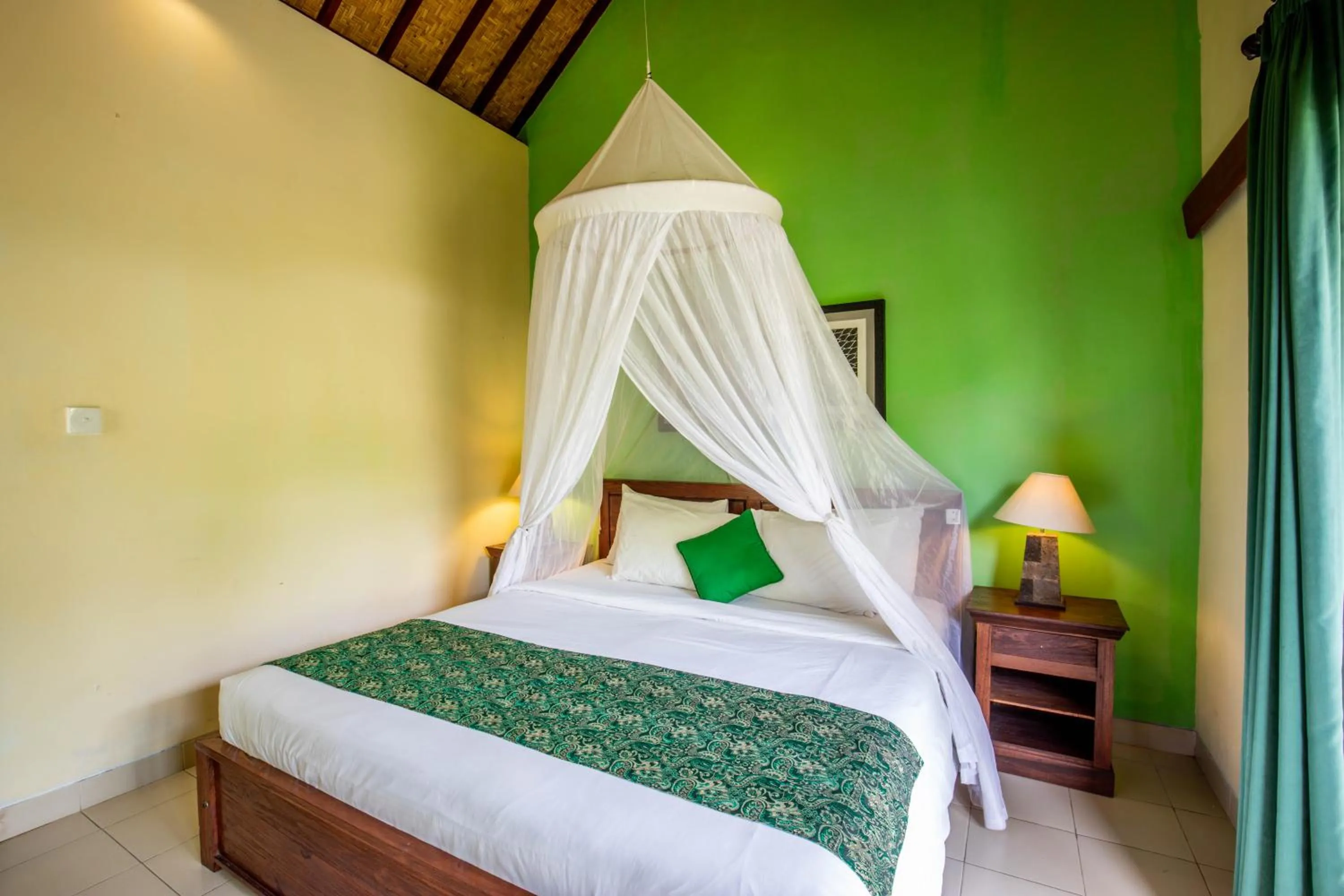 Bed in Sisin Ubud View