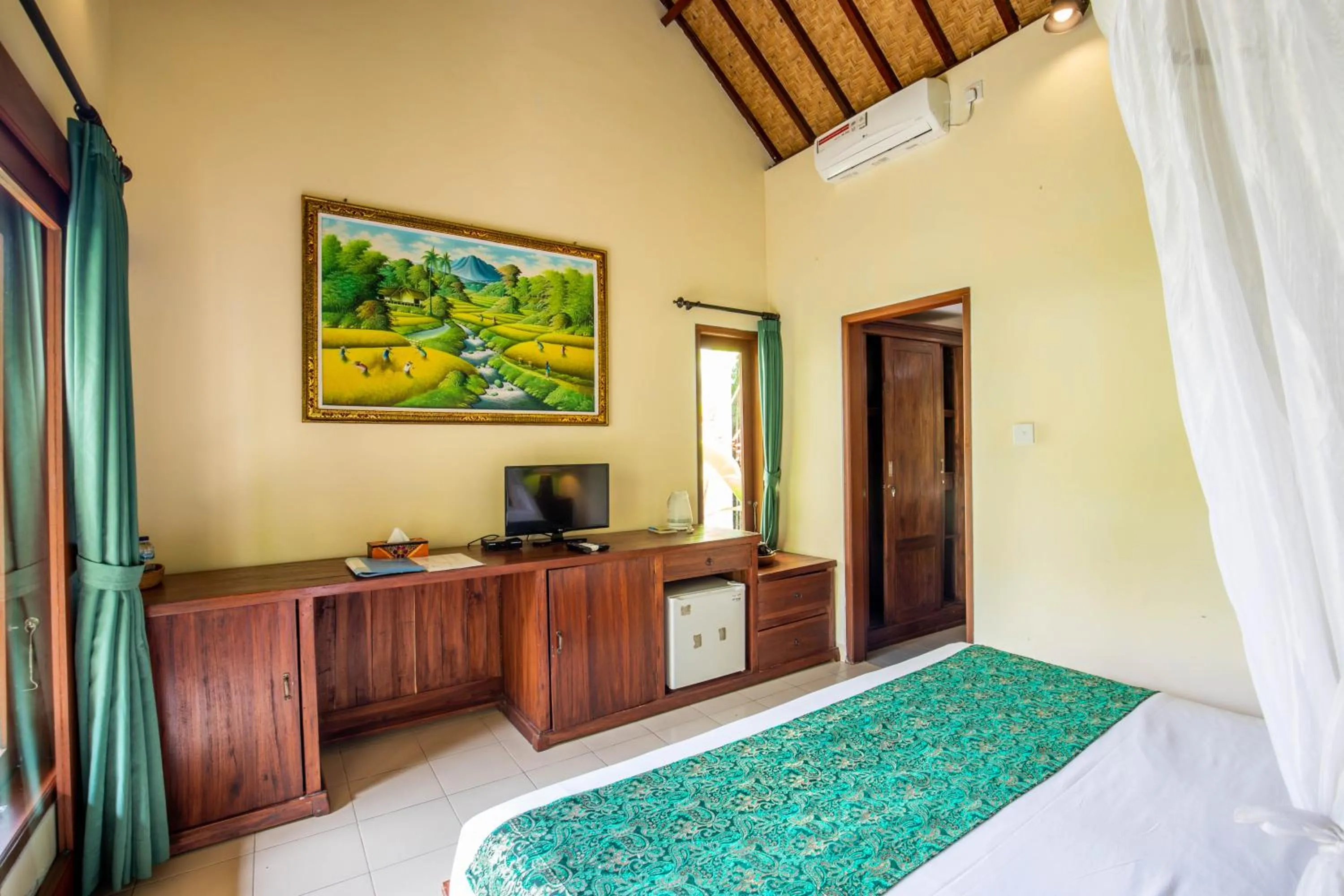 Communal lounge/ TV room in Sisin Ubud View