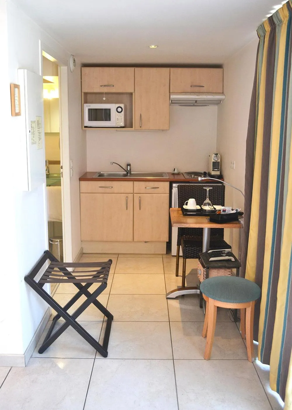 Kitchen or kitchenette in Hôtel la Scala