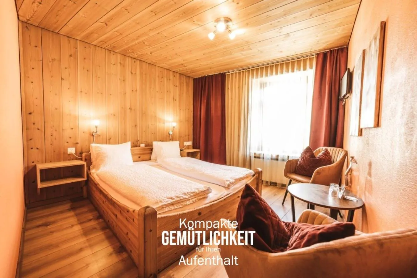 Bed in CURUNA Pensiun-Frühstückspension