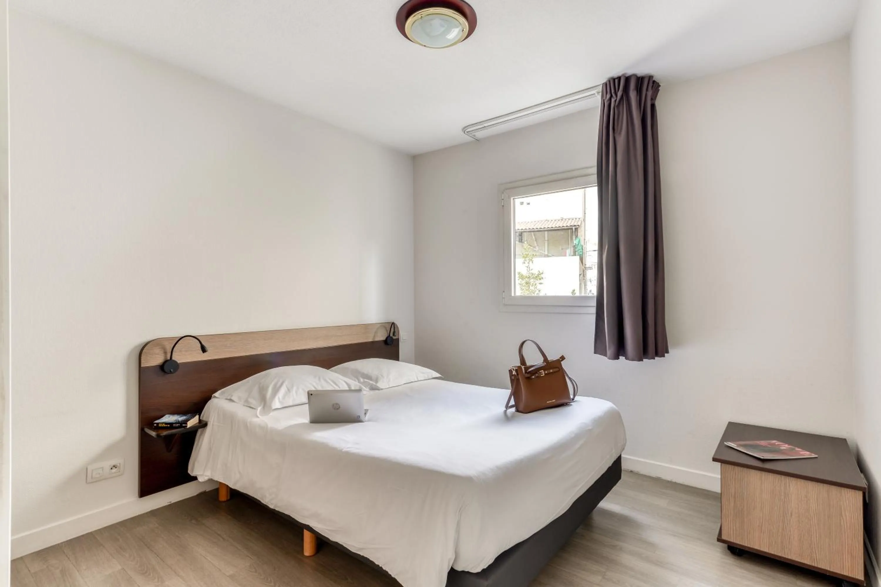 Bed in Zenitude Hôtel-Résidences Béziers Centre