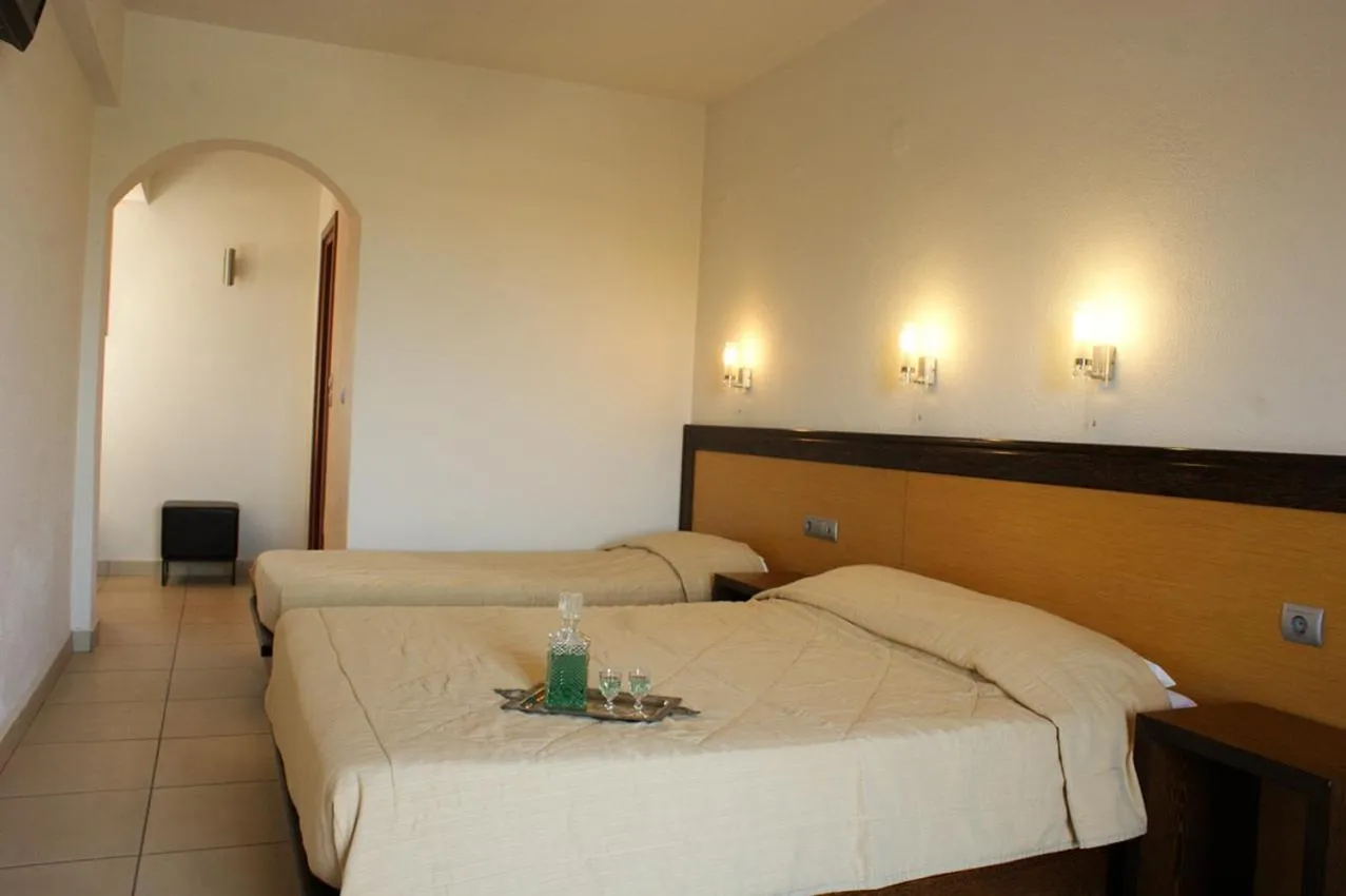 Bed in Aposperides Hotel