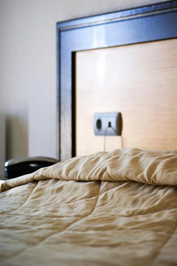 Bed in Aposperides Hotel